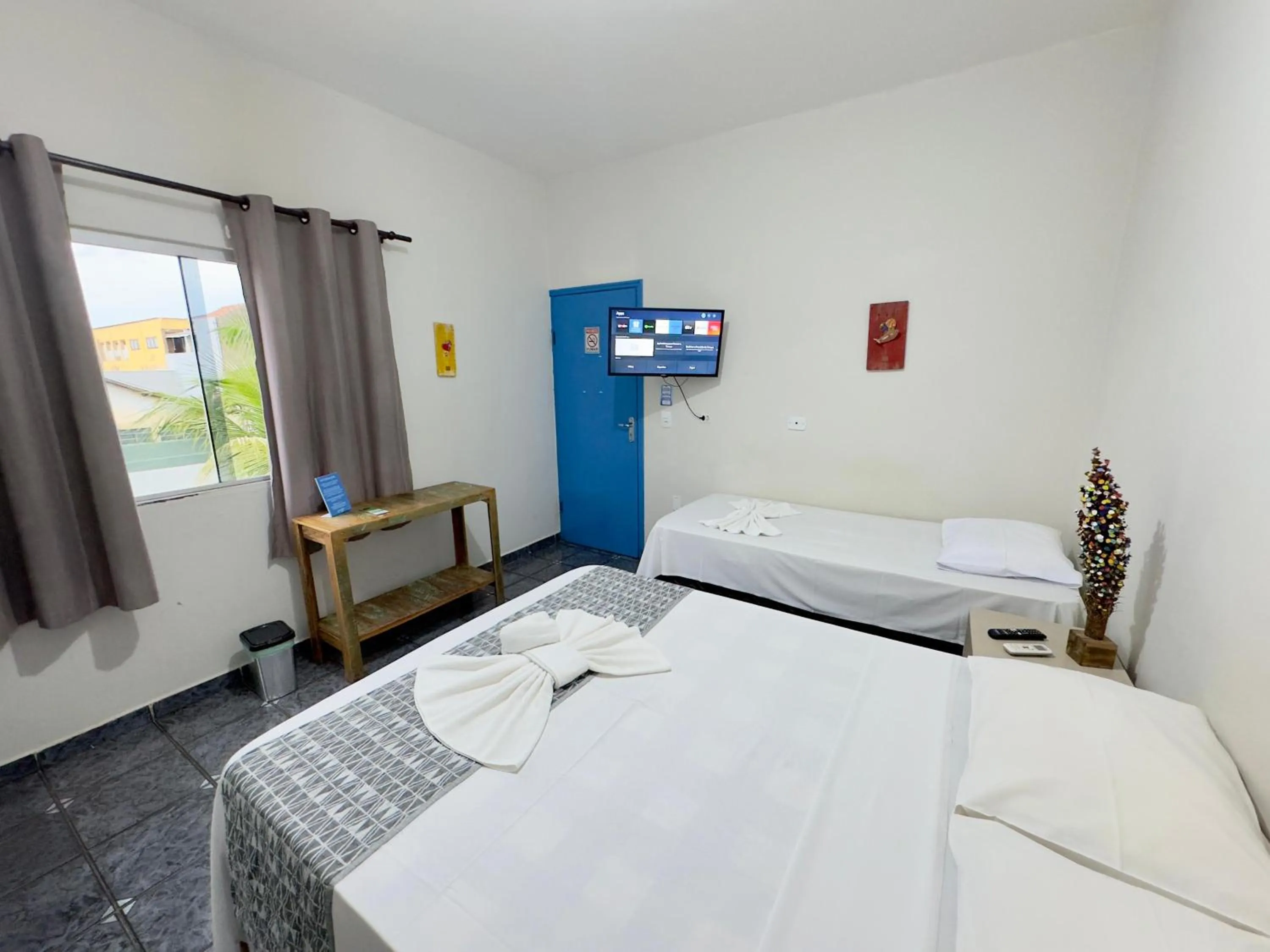 Bedroom, Bed in Pousada Cambará Suítes