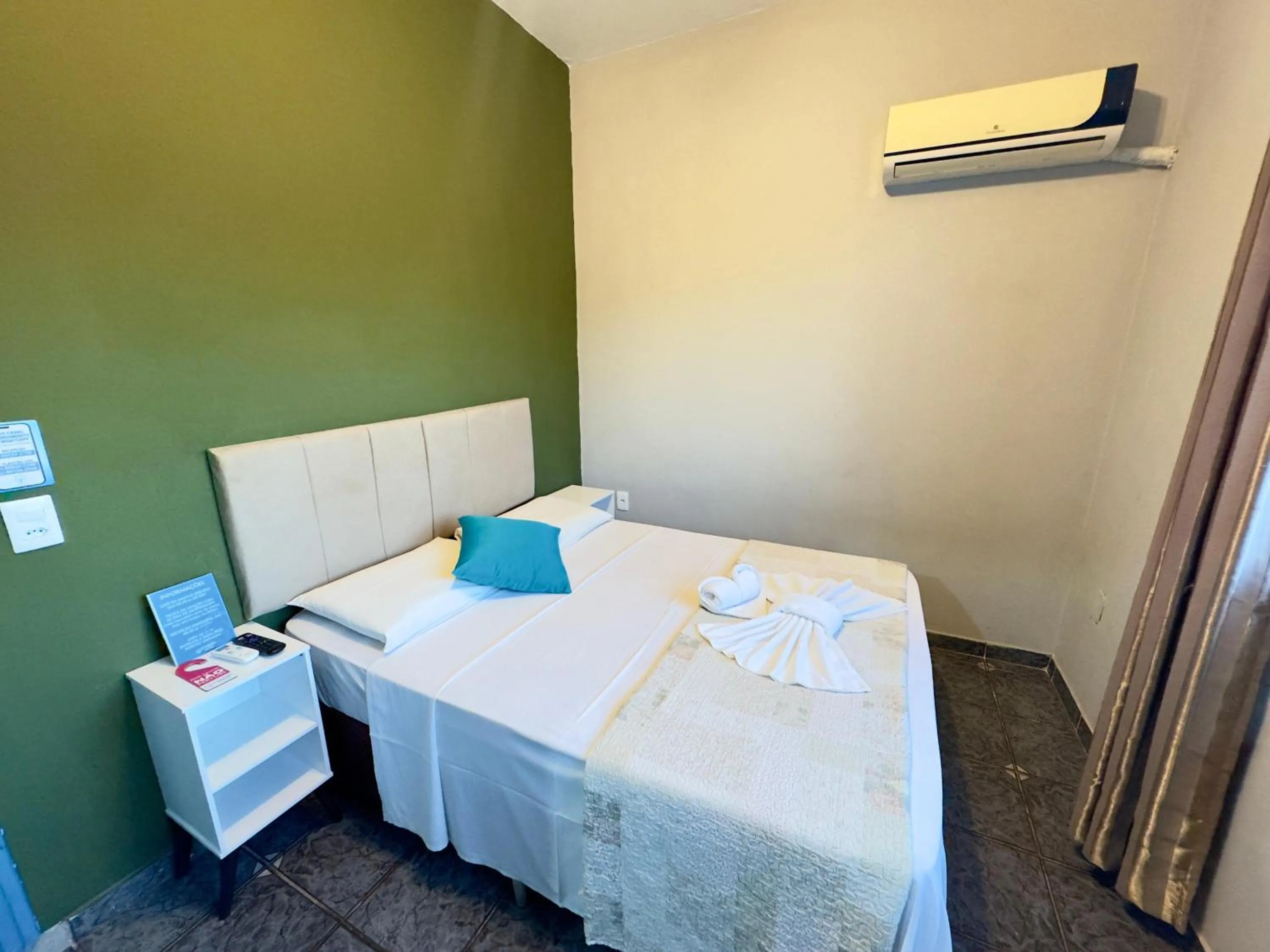 Bedroom, Bed in Pousada Cambará Suítes