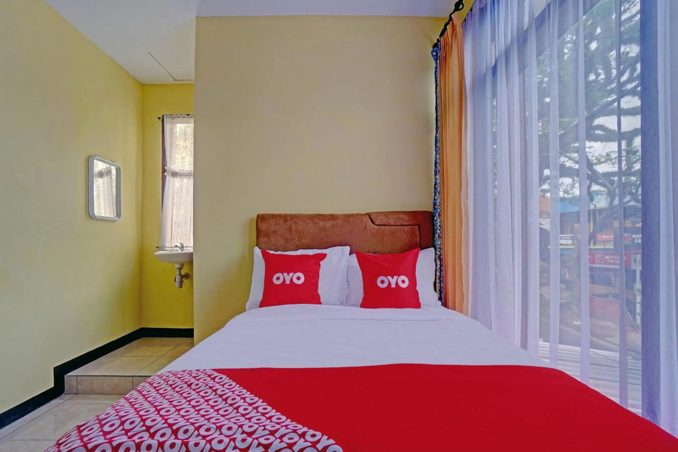 Bedroom, Bed in Hotel O Harwin Homestay