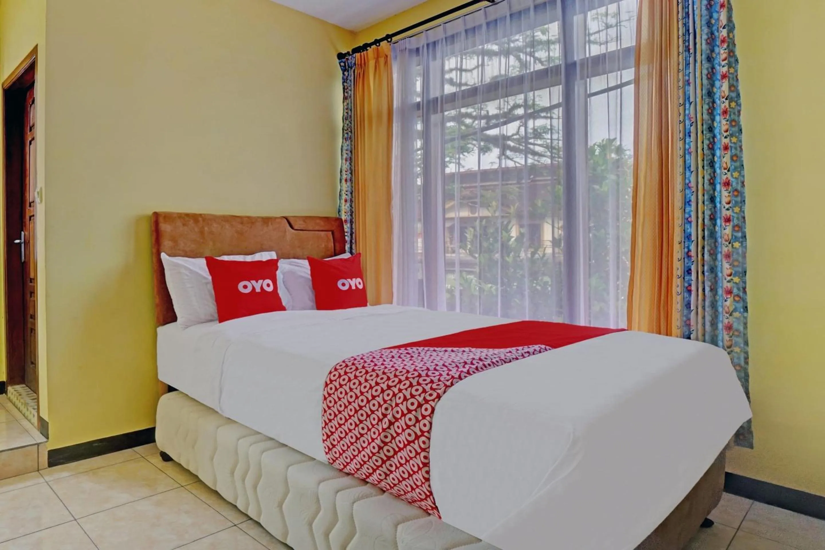 Bedroom, Bed in Hotel O Harwin Homestay