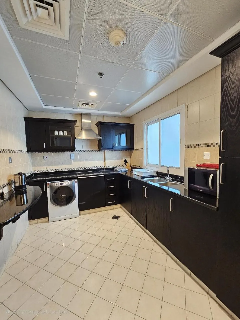 Kitchen or kitchenette in Rose Garden Hotel Apartments - Al Barsha, Near Metro Station