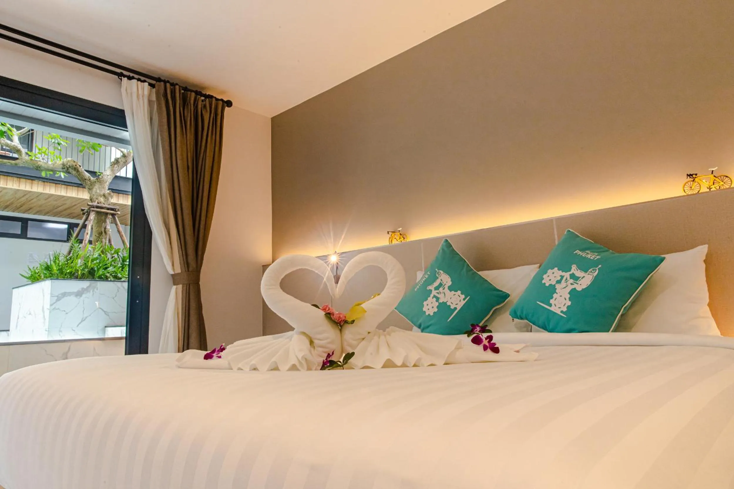Bedroom, Bed in Tour De Phuket Hotel - SHA Plus