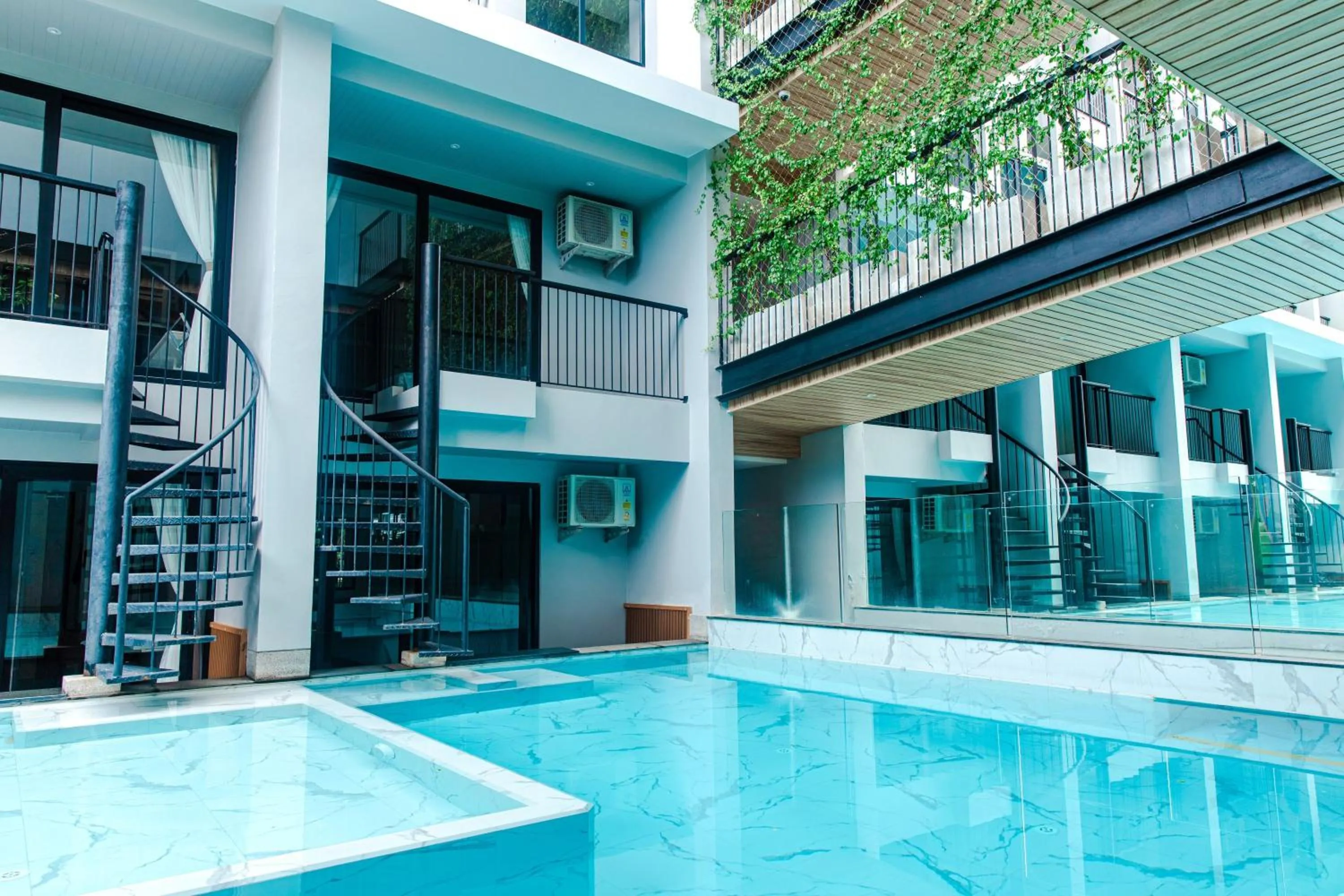 Swimming pool in Tour De Phuket Hotel - SHA Plus