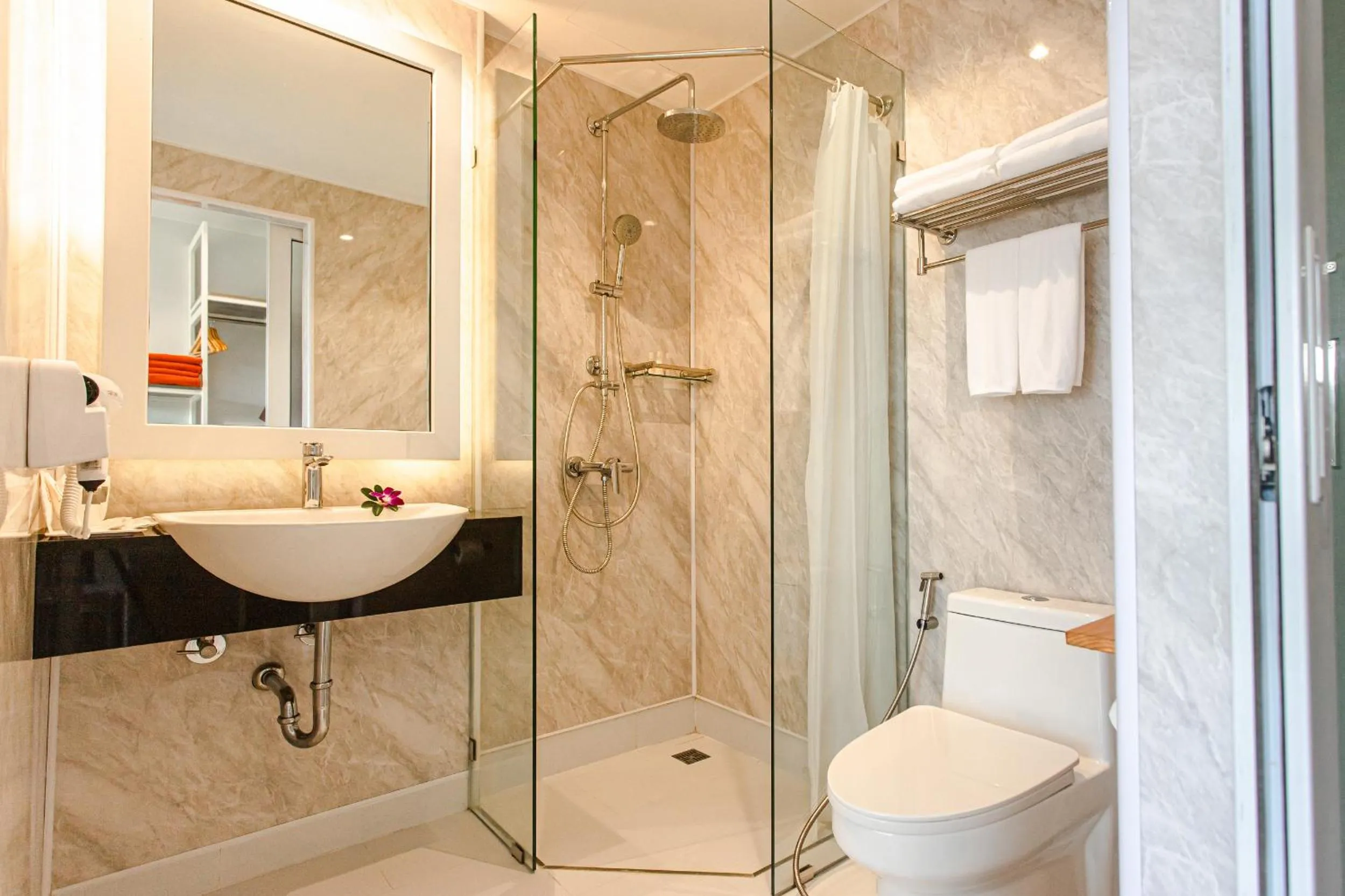 Bathroom in Tour De Phuket Hotel - SHA Plus