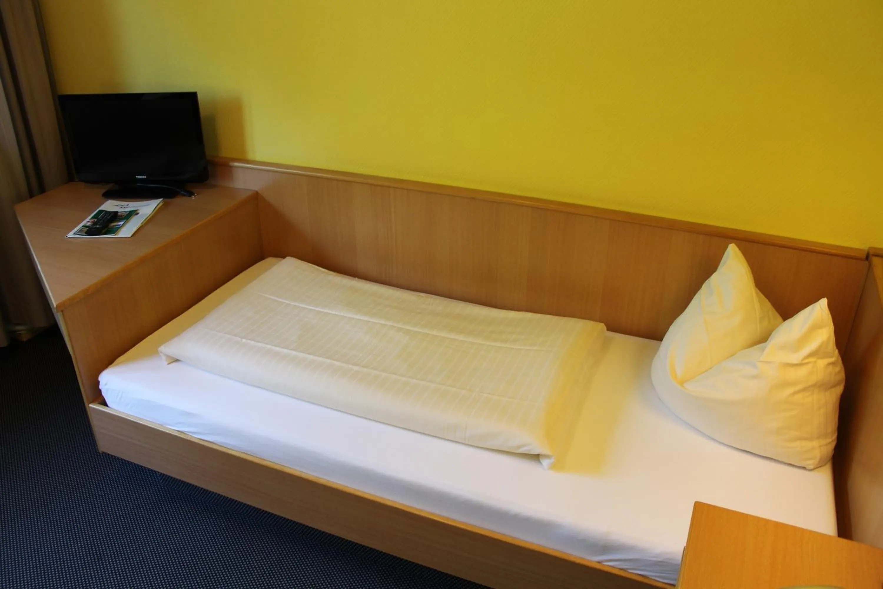 Bed in Hotel Grunewald