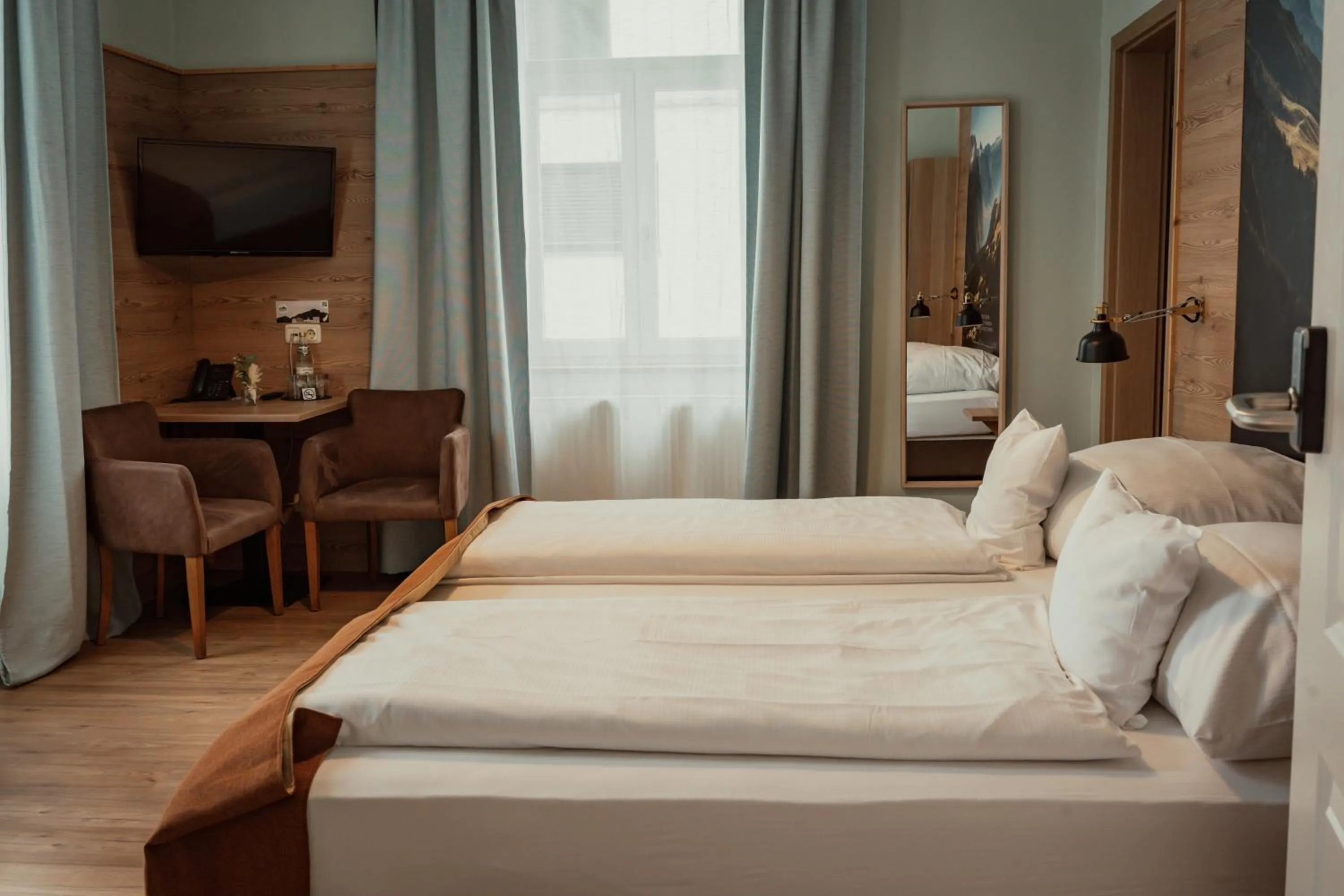 Photo of the whole room, Bed in Alpenstadthotels