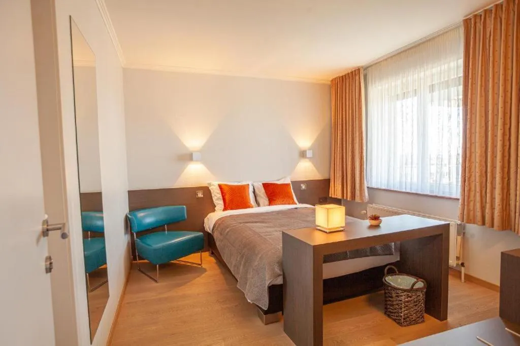 Bed in Hotel Monaco Zeebrugge Beach by Rikas Hotels