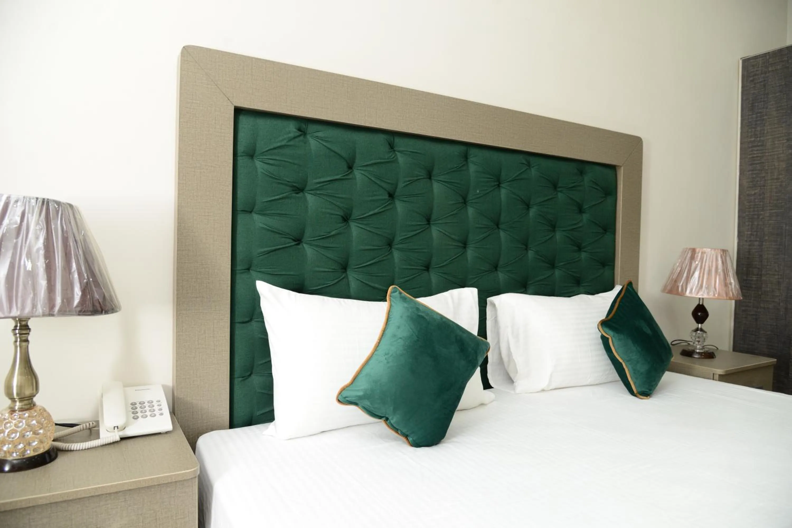 Bed in Hotel Deluxe Lahore