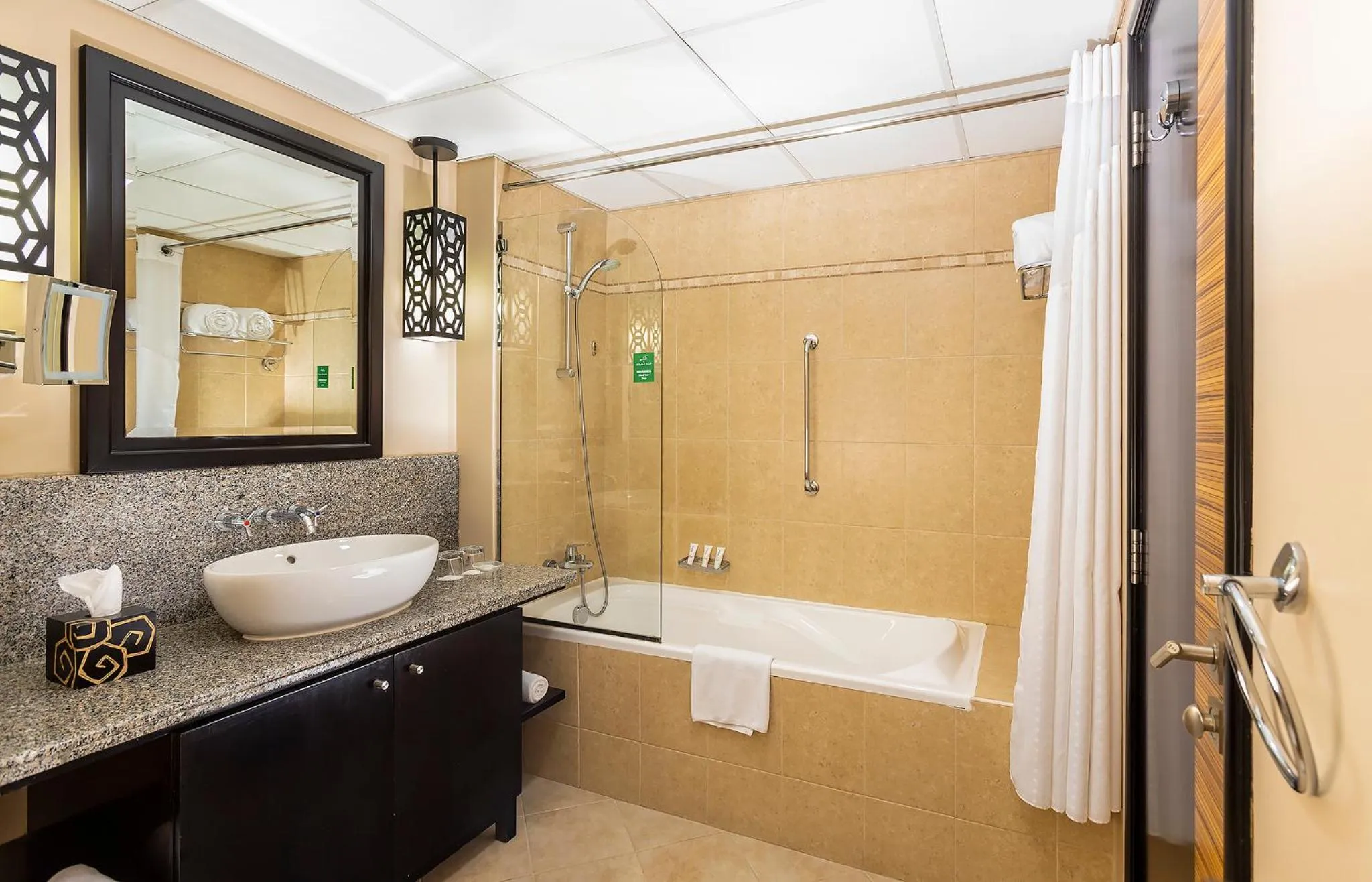 Bathroom in Holiday Inn Dubai Al Barsha by IHG