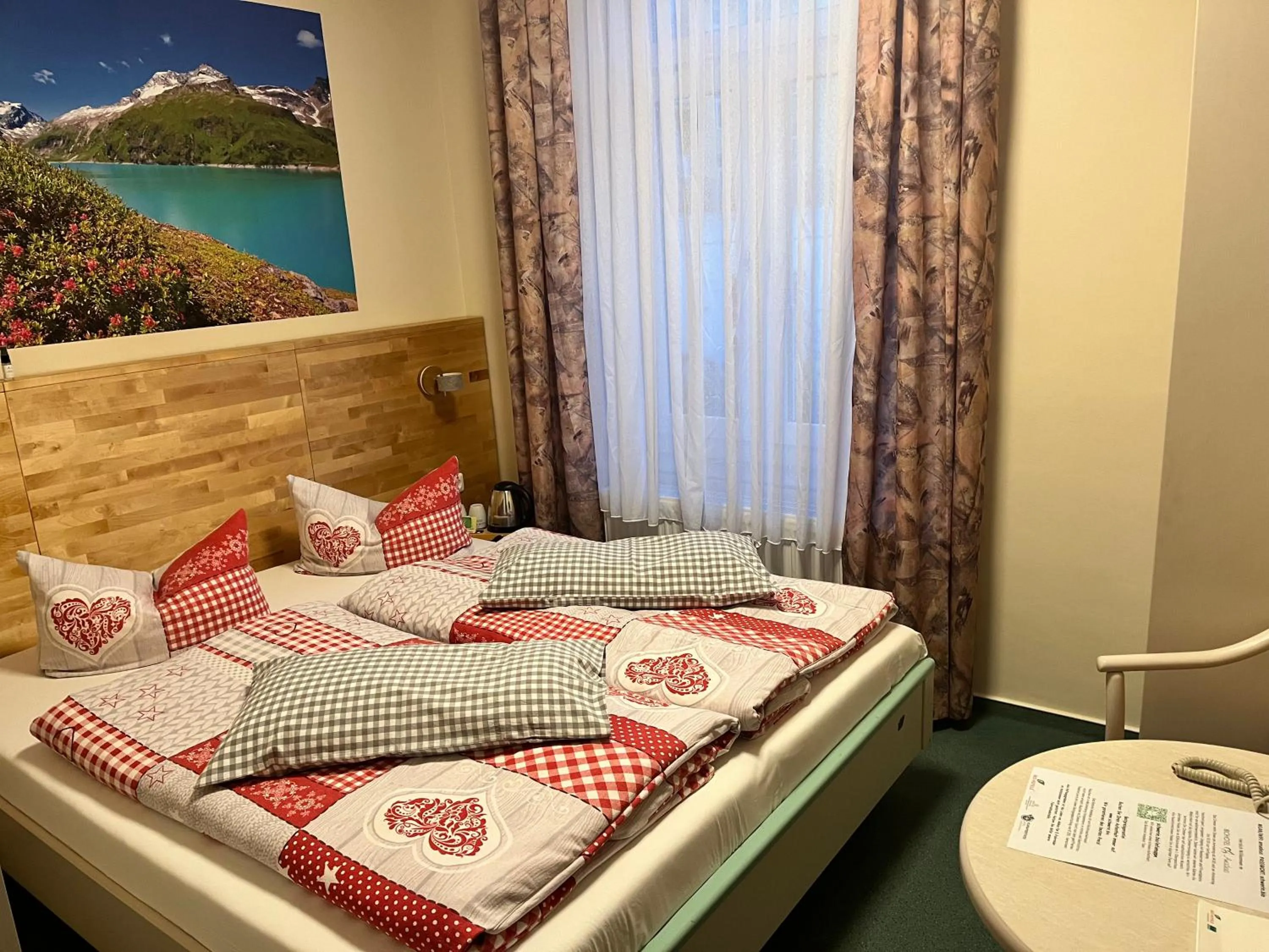 Photo of the whole room, Bed in Biohotel Amadeus