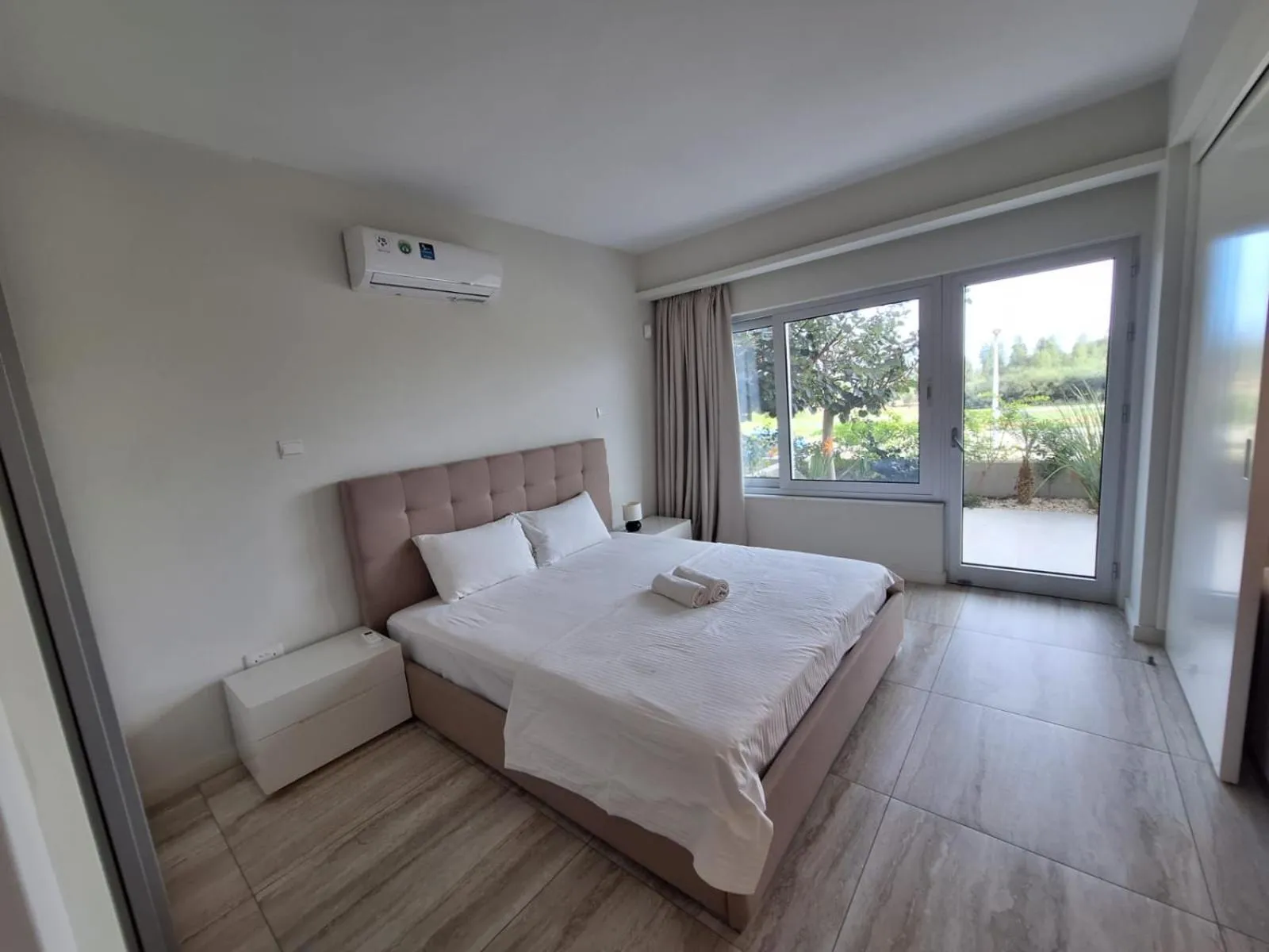 Bed in Emerald Suites