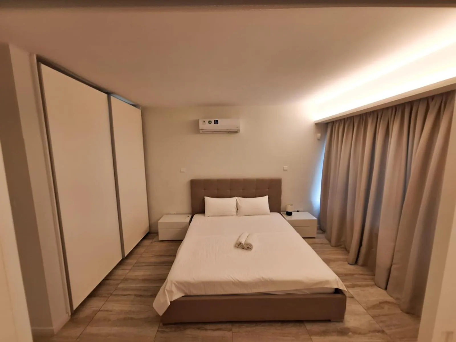 Bed in Emerald Suites