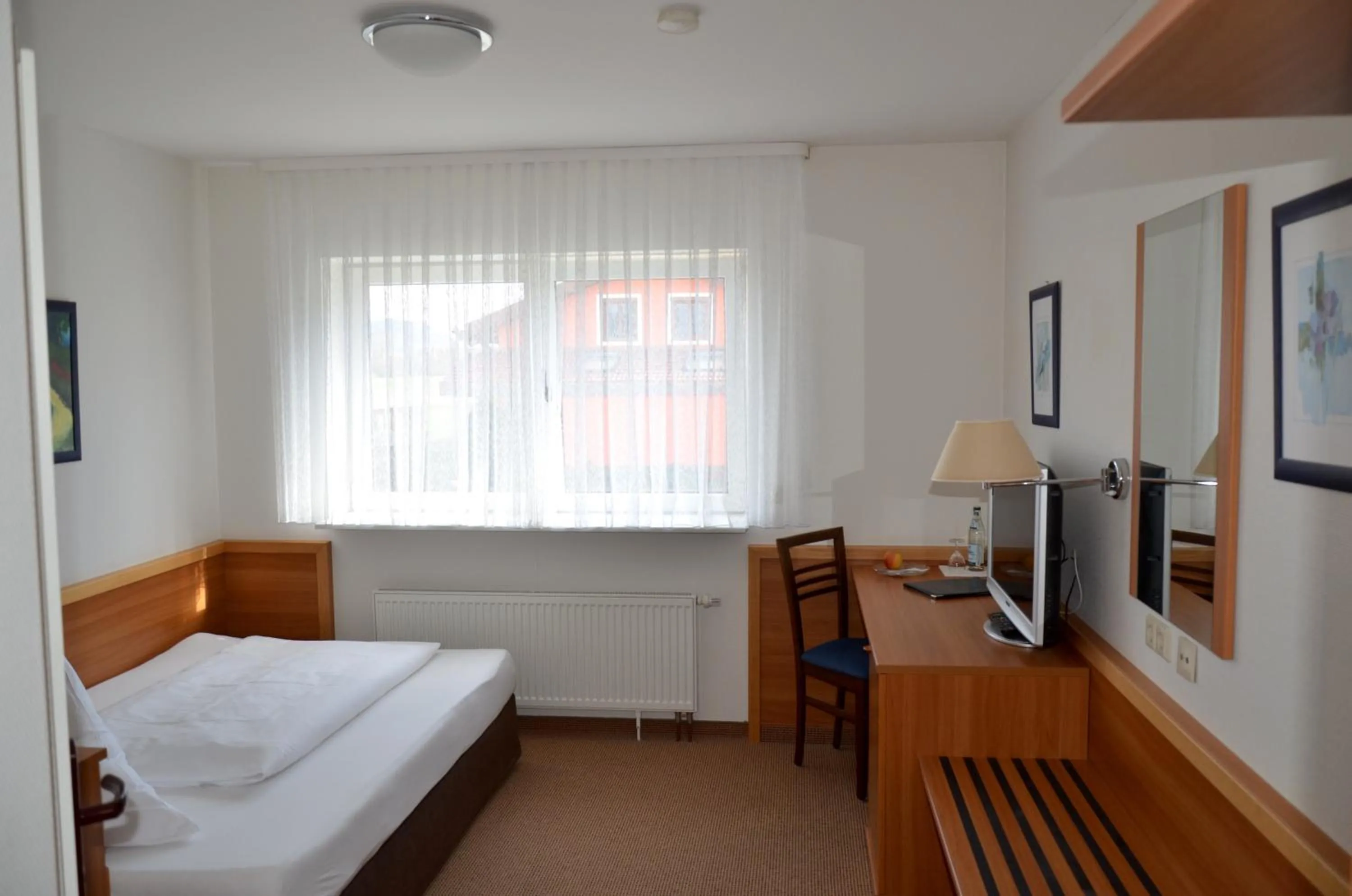 Photo of the whole room, Bed in Hotel Höllsteiner Hof