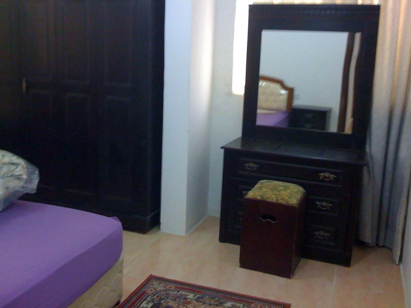 Bed in Red Tower Furnished Apartments