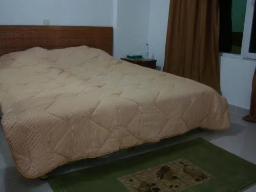 Bed in Red Tower Furnished Apartments