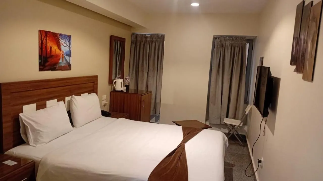 Bed in Royal Inn Residence