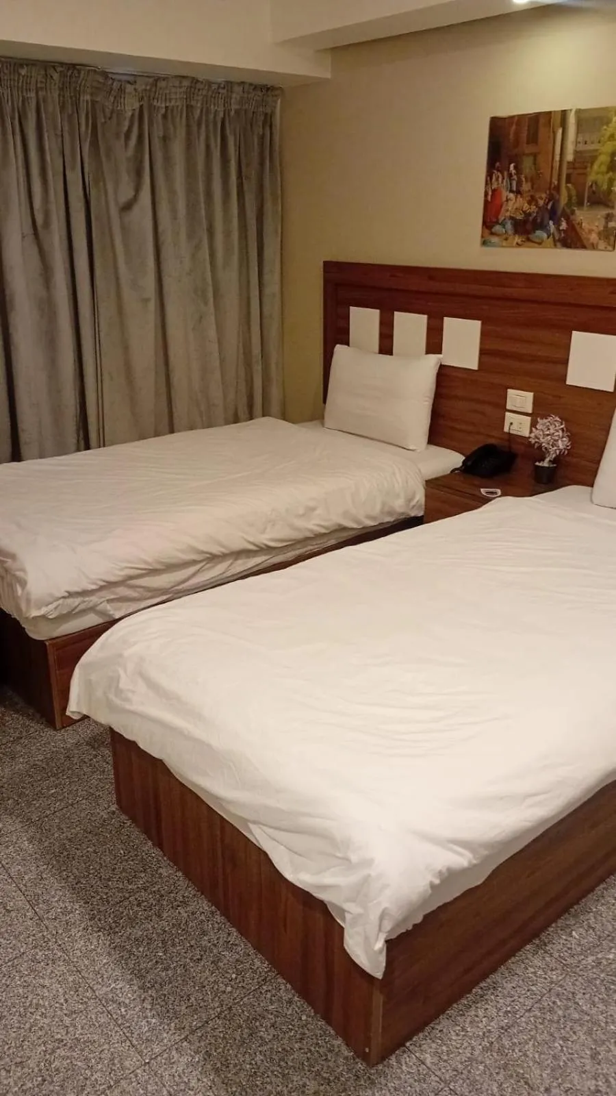 Bed in Royal Inn Residence