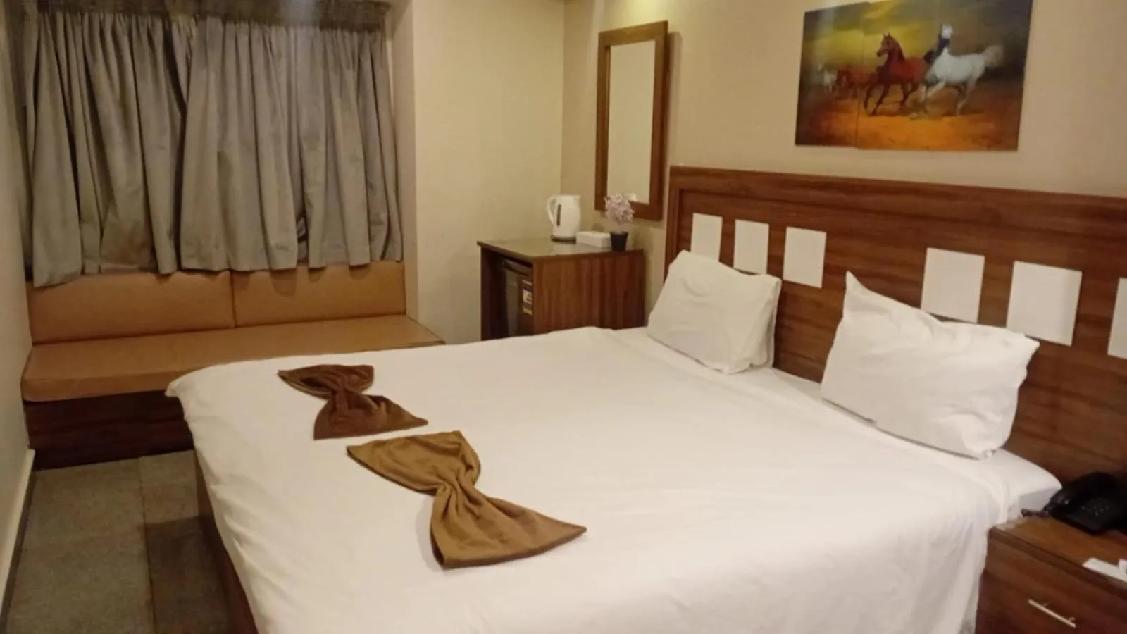 Bed in Royal Inn Residence