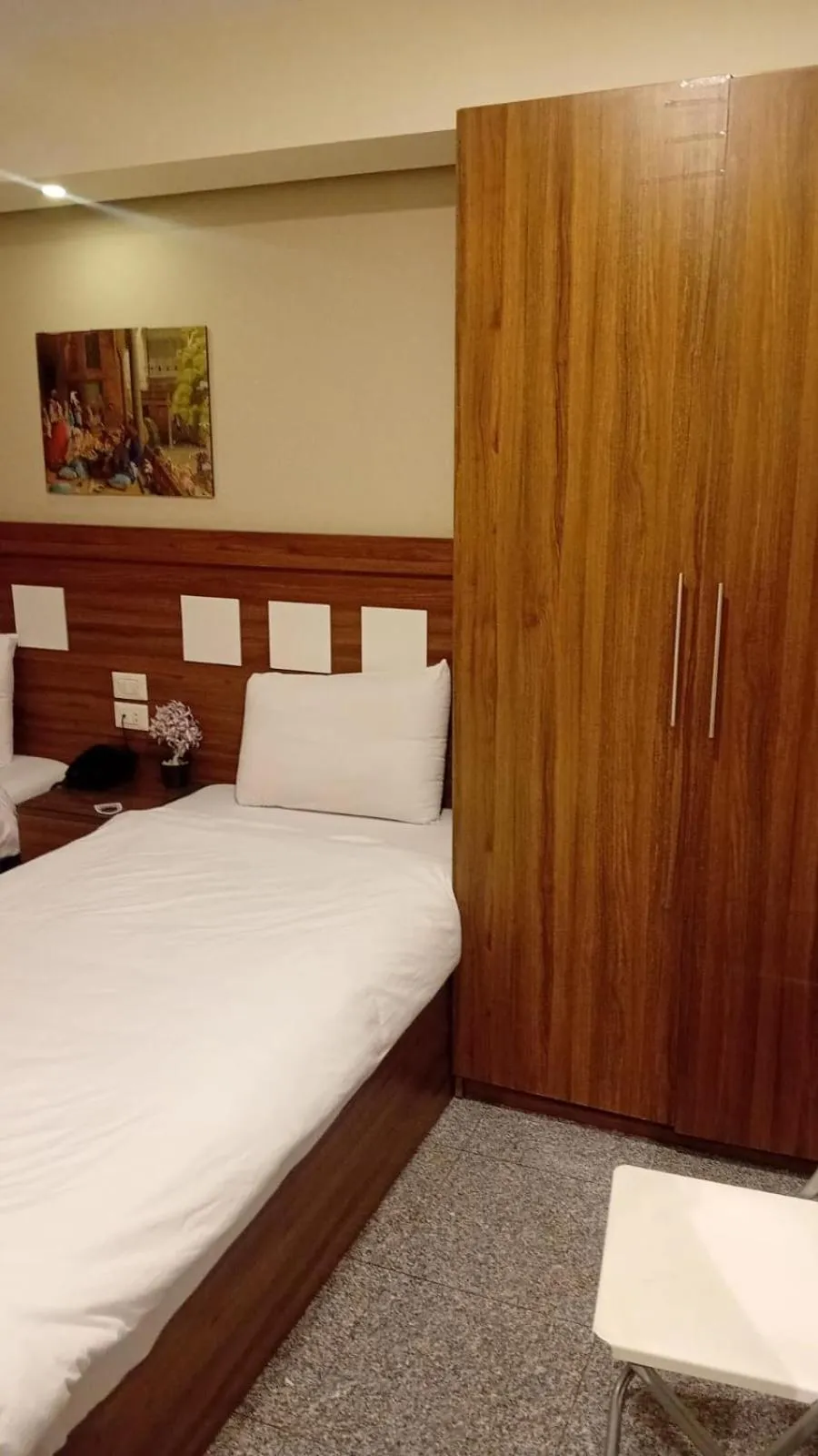 Bed in Royal Inn Residence