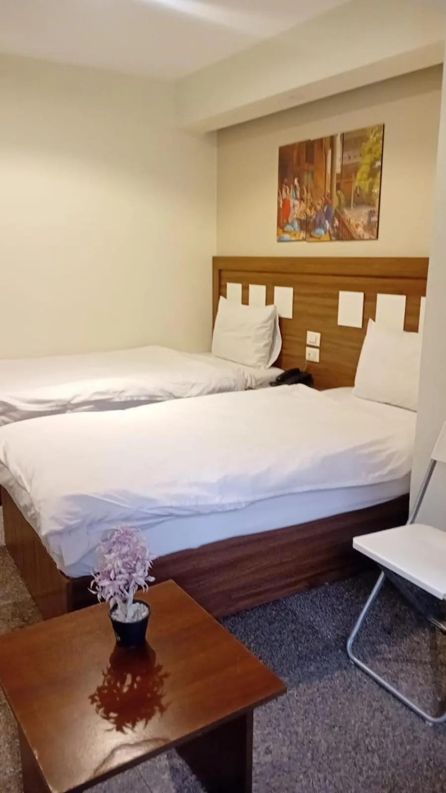 Bed in Royal Inn Residence