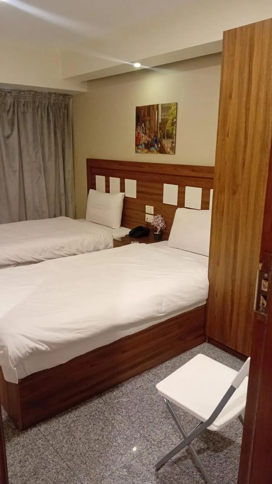 Bed in Royal Inn Residence