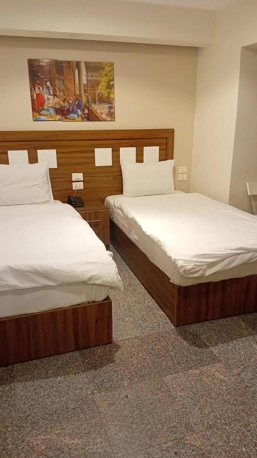 Bed in Royal Inn Residence