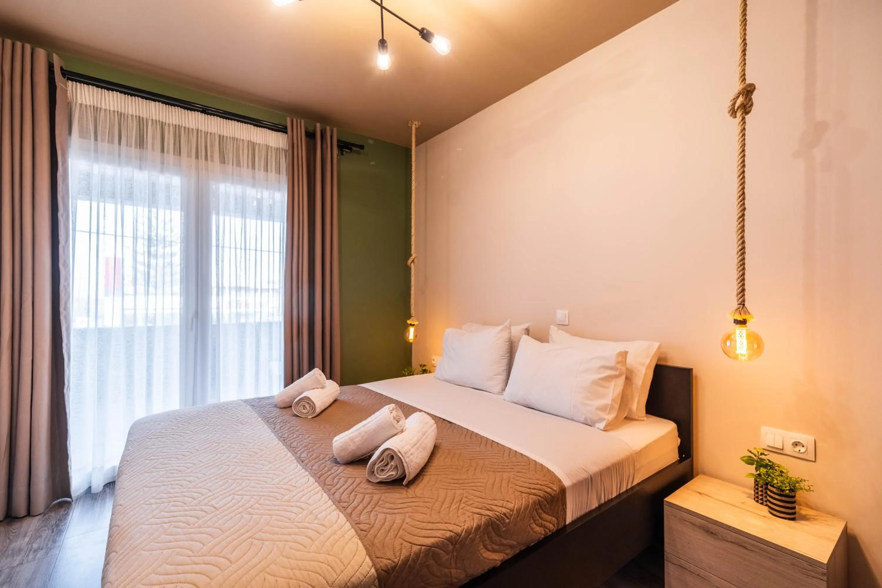 Bed in Semiso Beach Suites