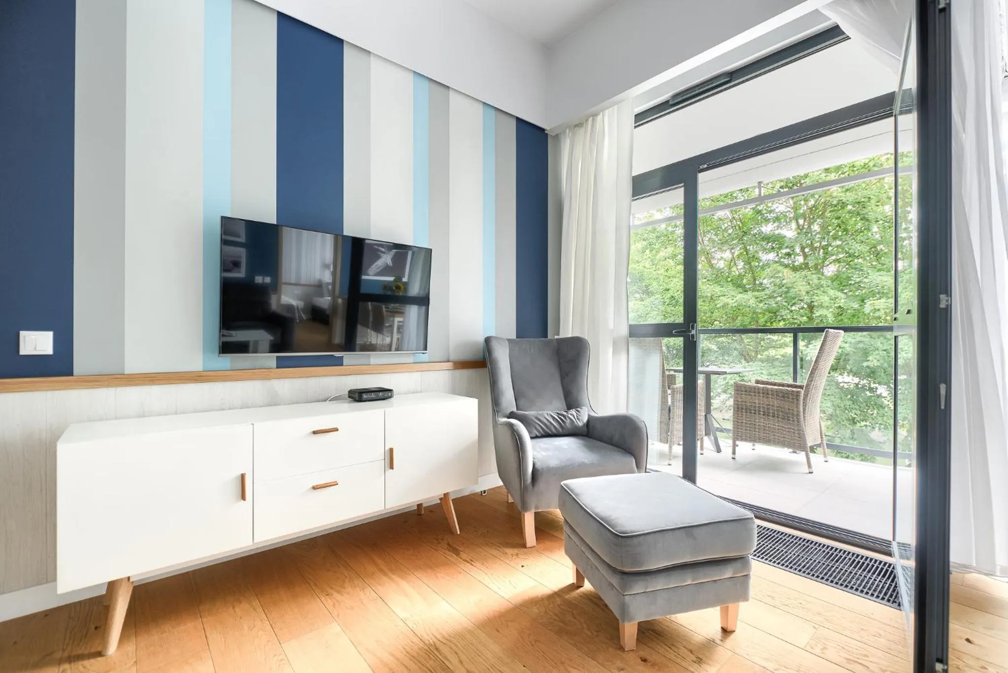 Communal lounge/ TV room in Dune Resort Mielno - A