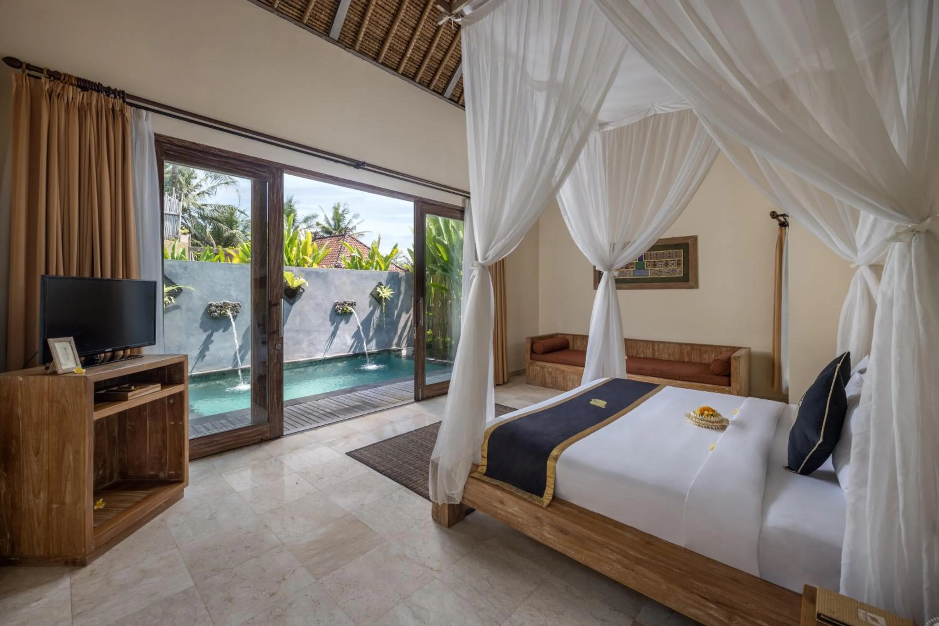 Bed in The Sankara Resort & Spa