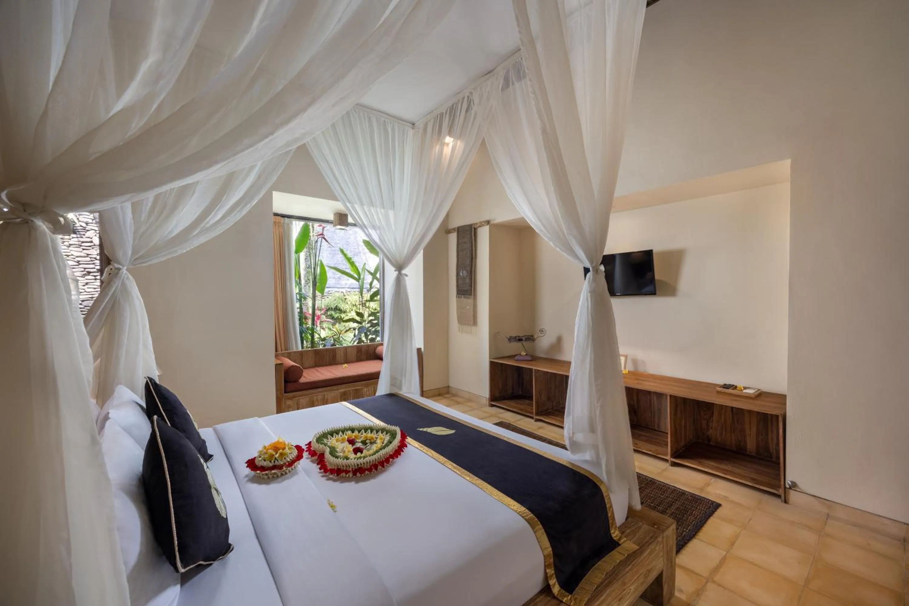 Bed in The Sankara Resort & Spa