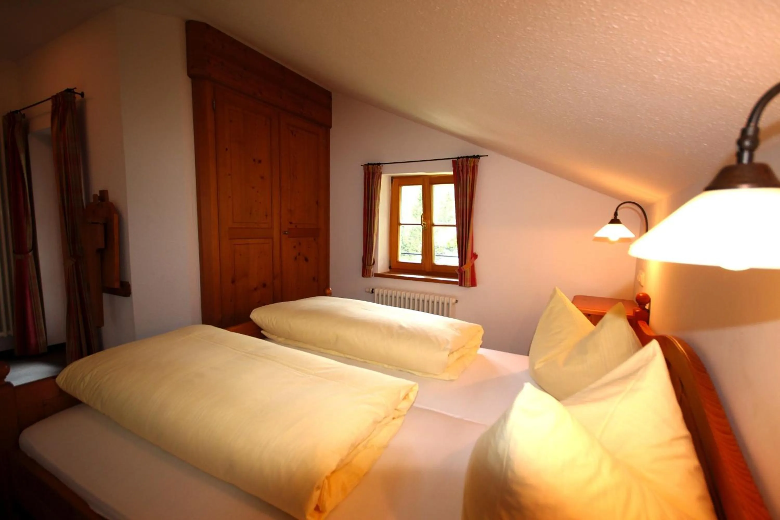 Photo of the whole room, Bed in Berghotel Sudelfeld