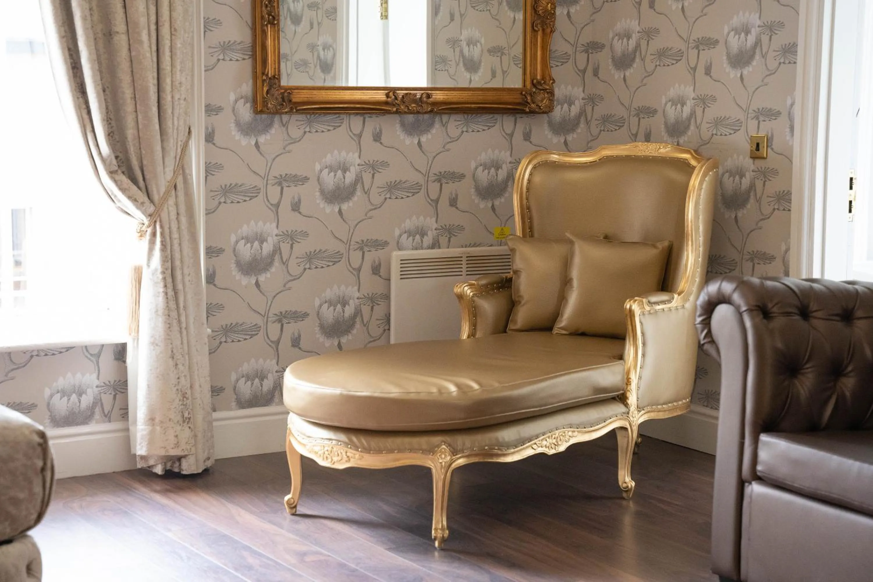 Seating area in RainHill Hall Hotel