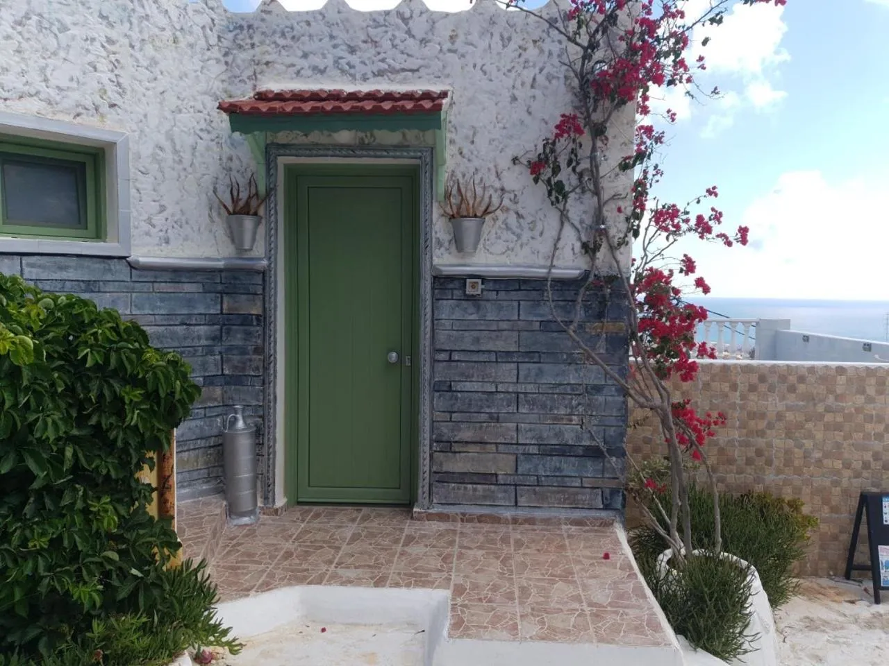 Facade/entrance in Private Studio Korifi sea view