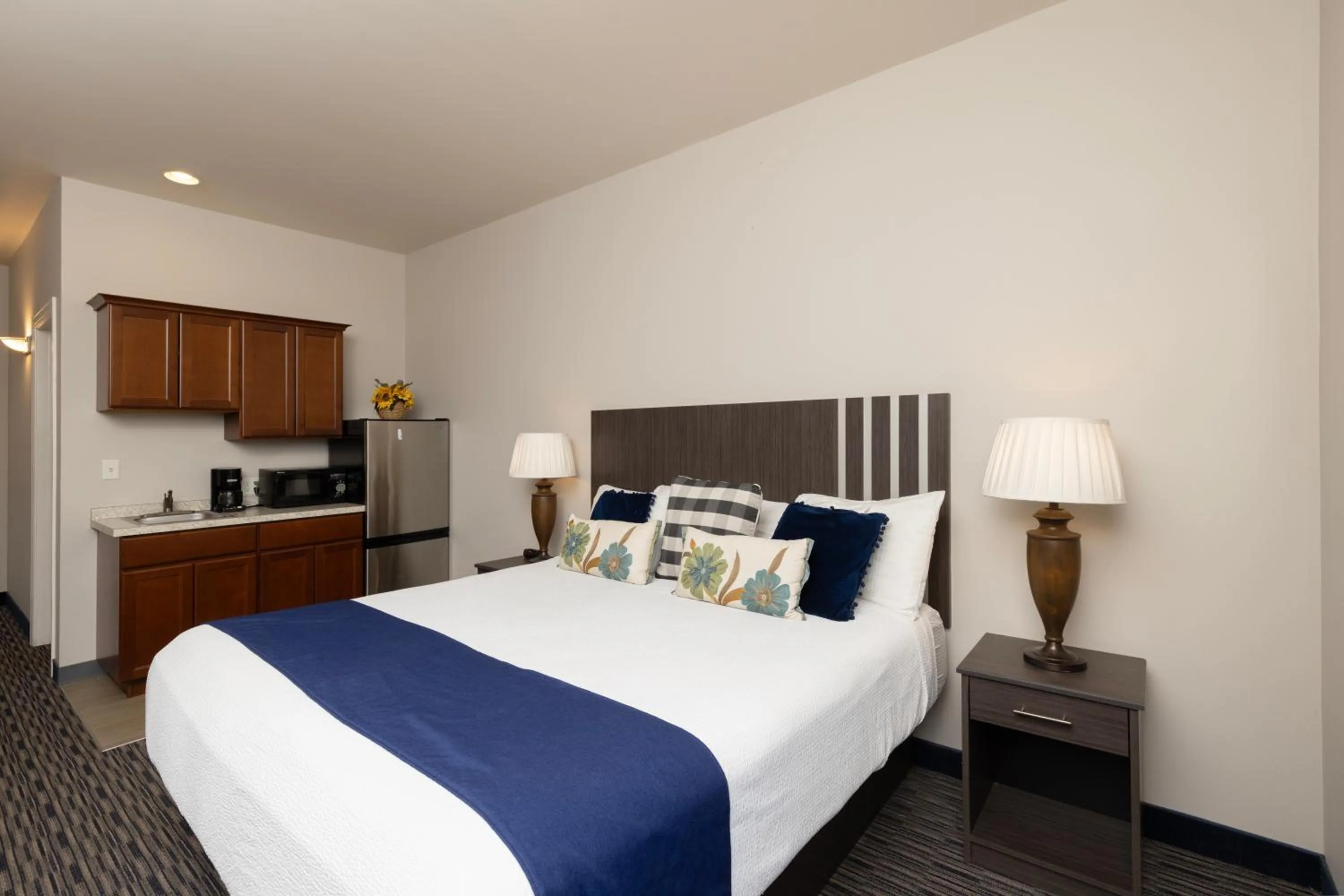 Bed in Brinton Suites