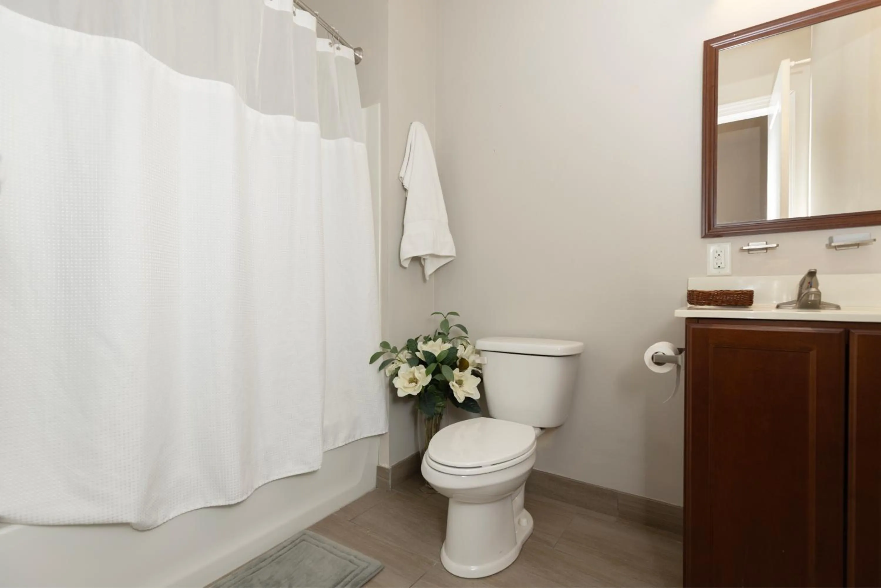 Toilet in Brinton Suites