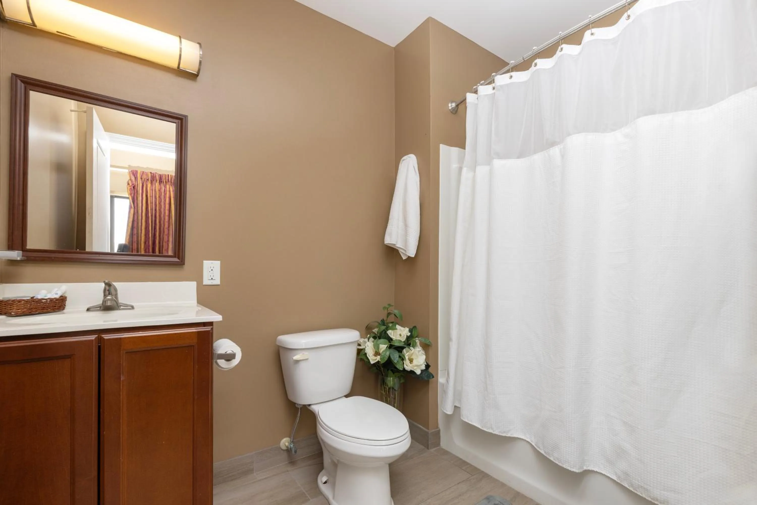 Toilet in Brinton Suites