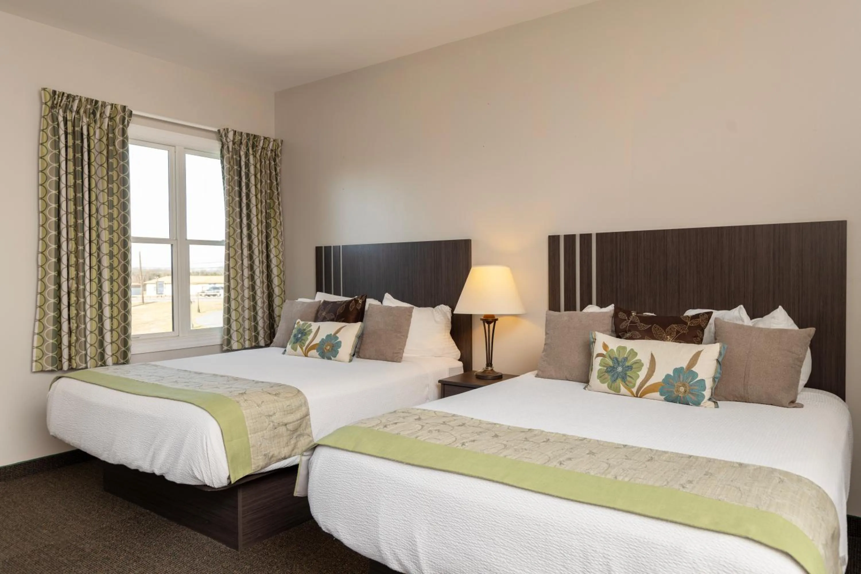 Bed in Brinton Suites