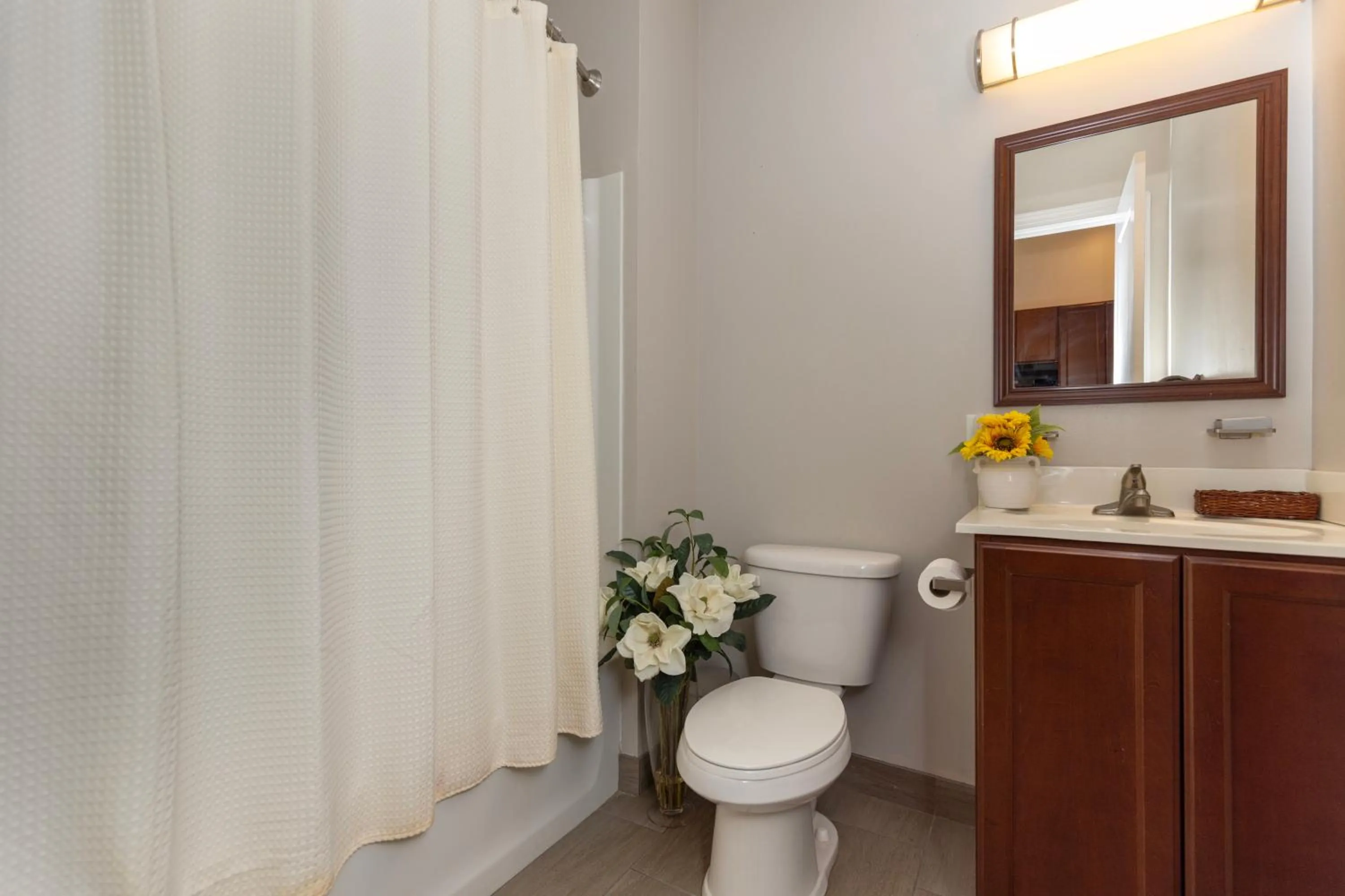 Toilet in Brinton Suites