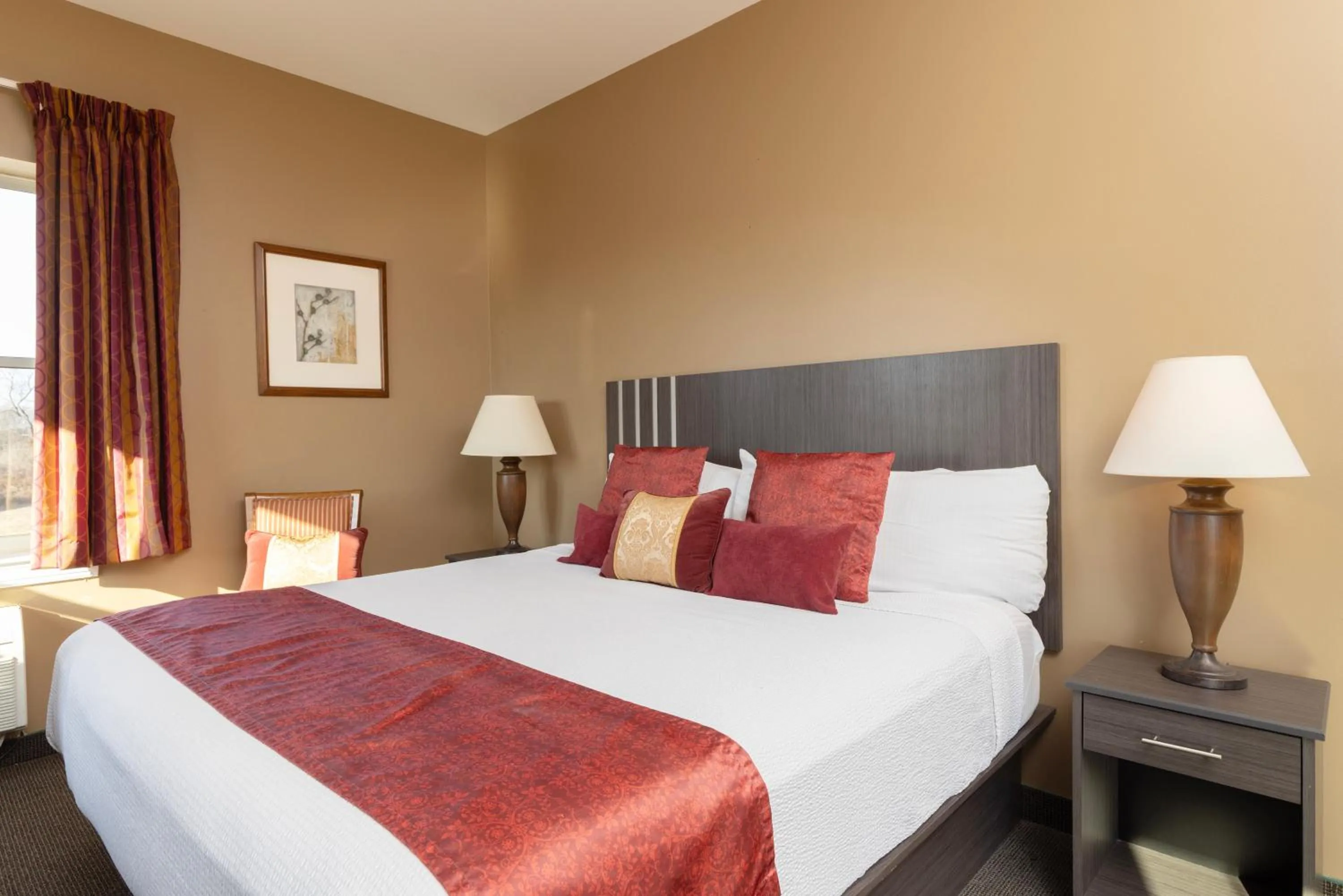 Bed in Brinton Suites