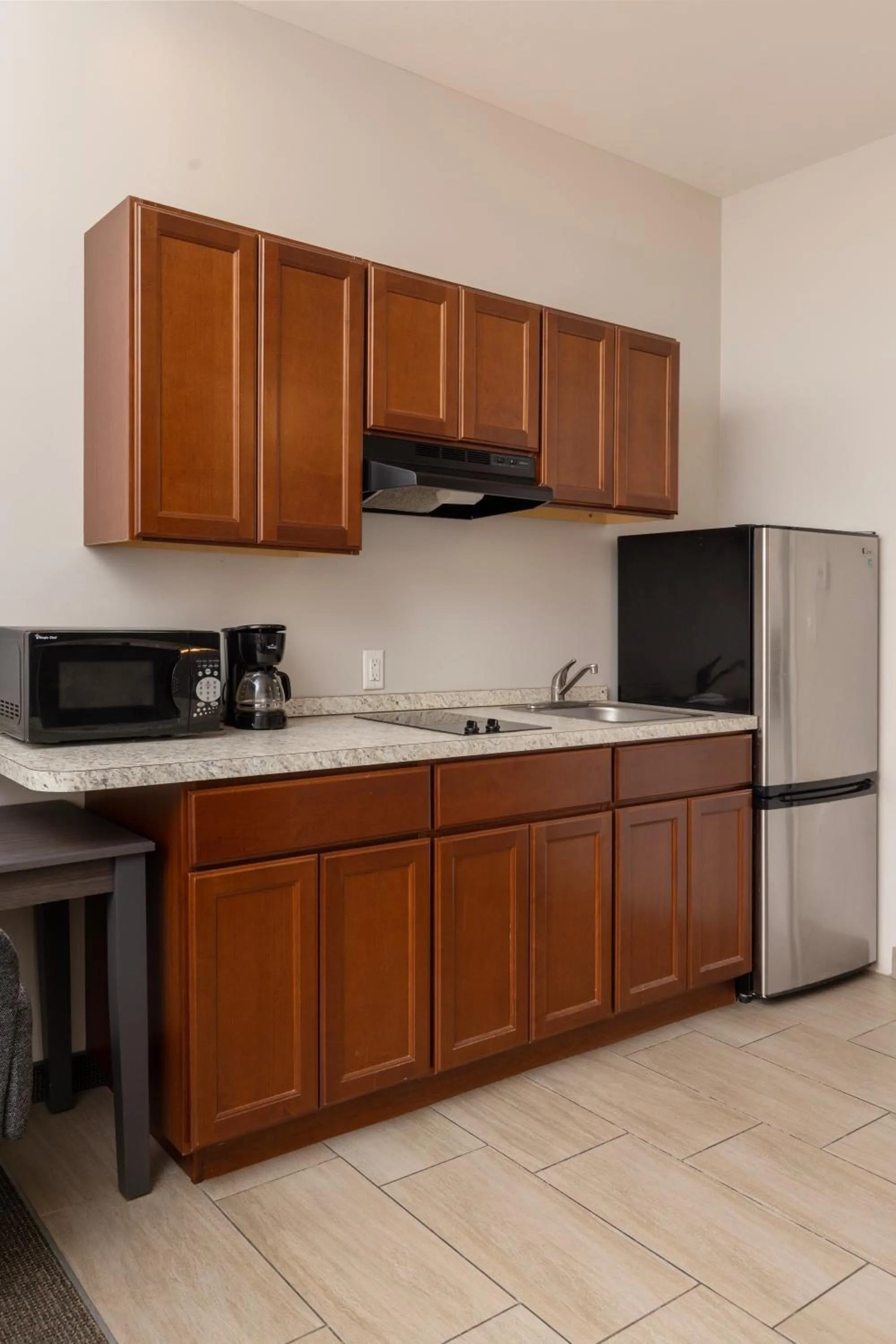 Kitchen or kitchenette in Brinton Suites