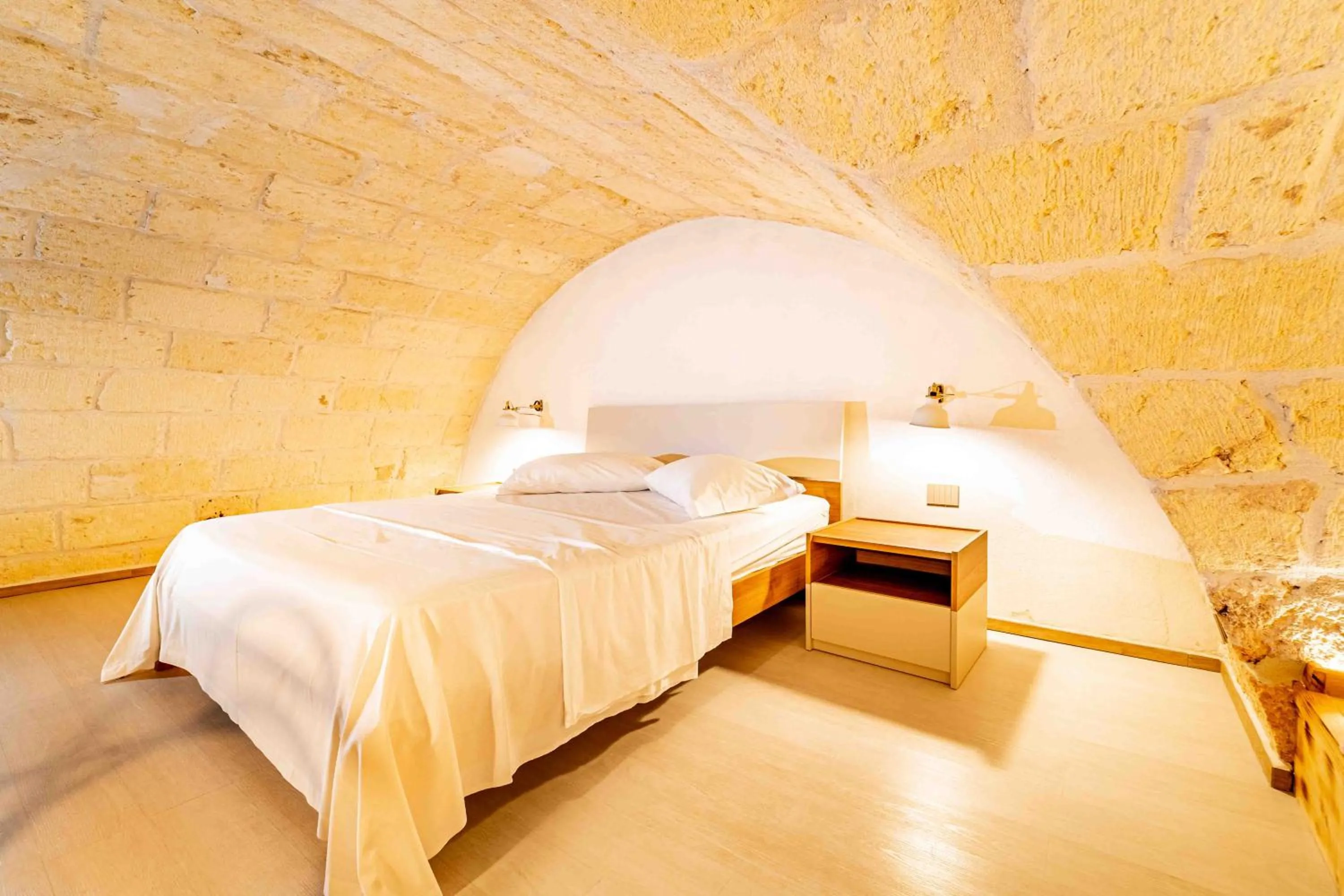 Bed in Il Melograno - Suite Deluxe