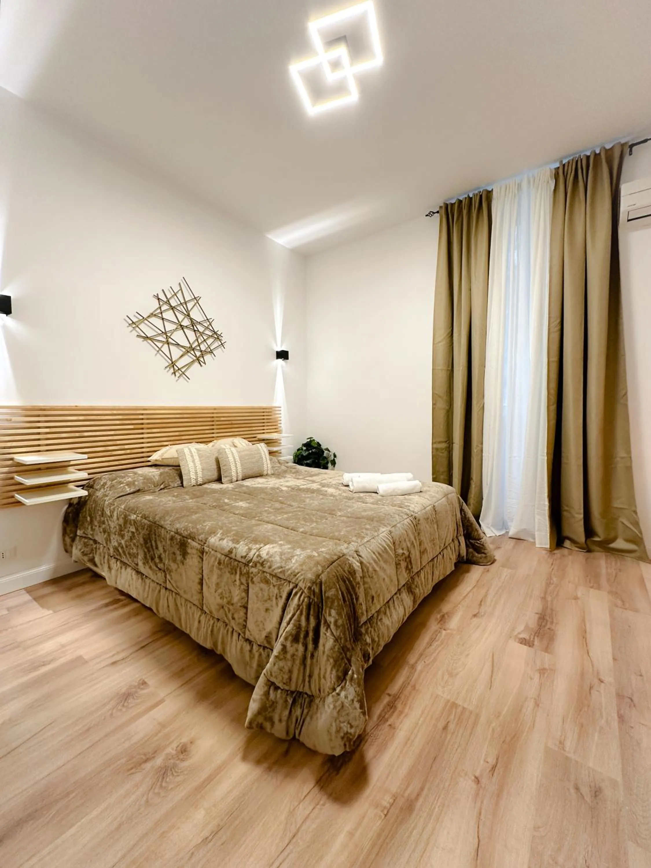 Bed in Colosseum Luxury Guest House