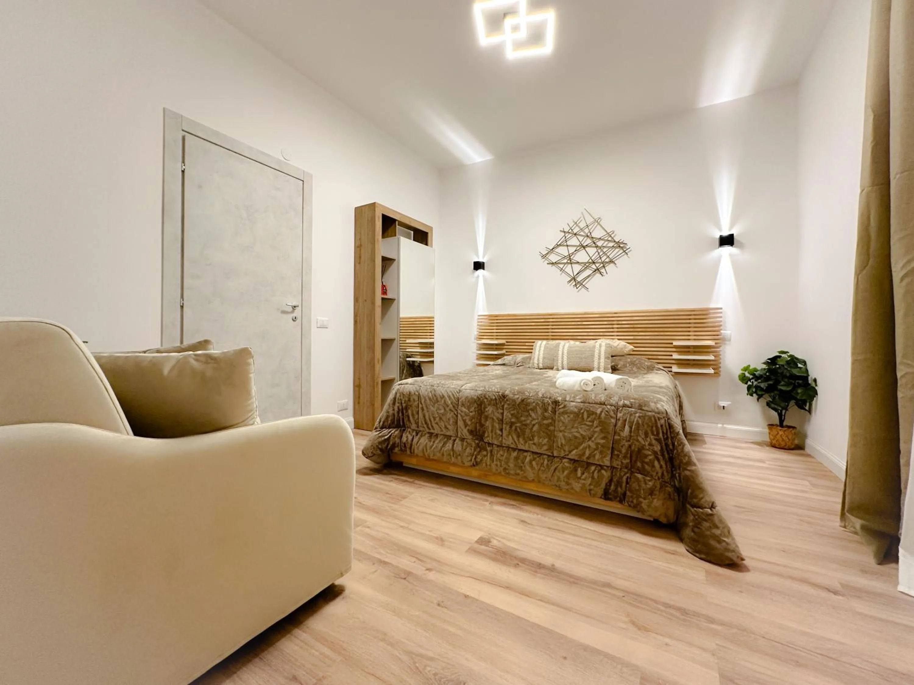 Bed in Colosseum Luxury Guest House