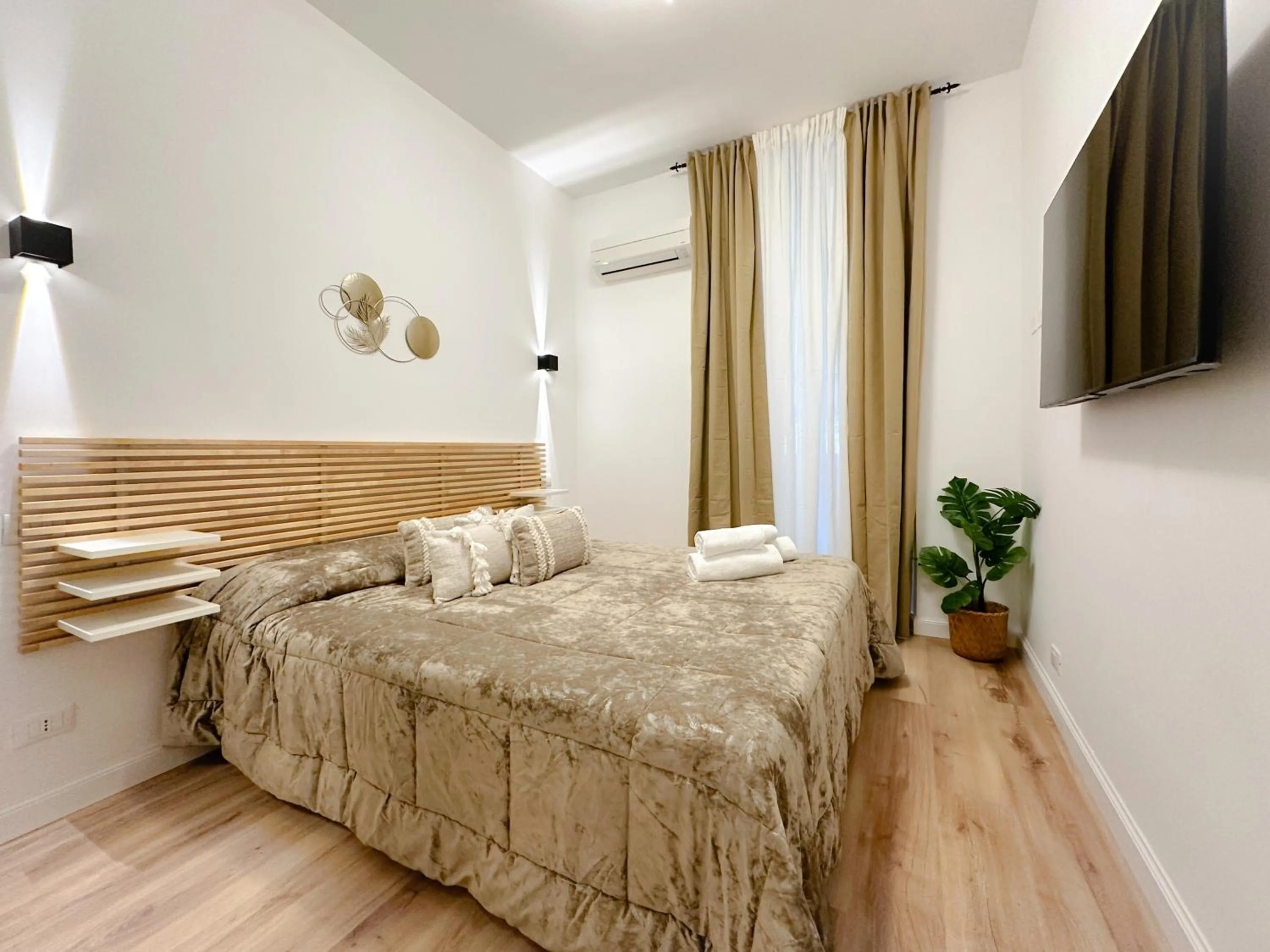 Bed in Colosseum Luxury Guest House