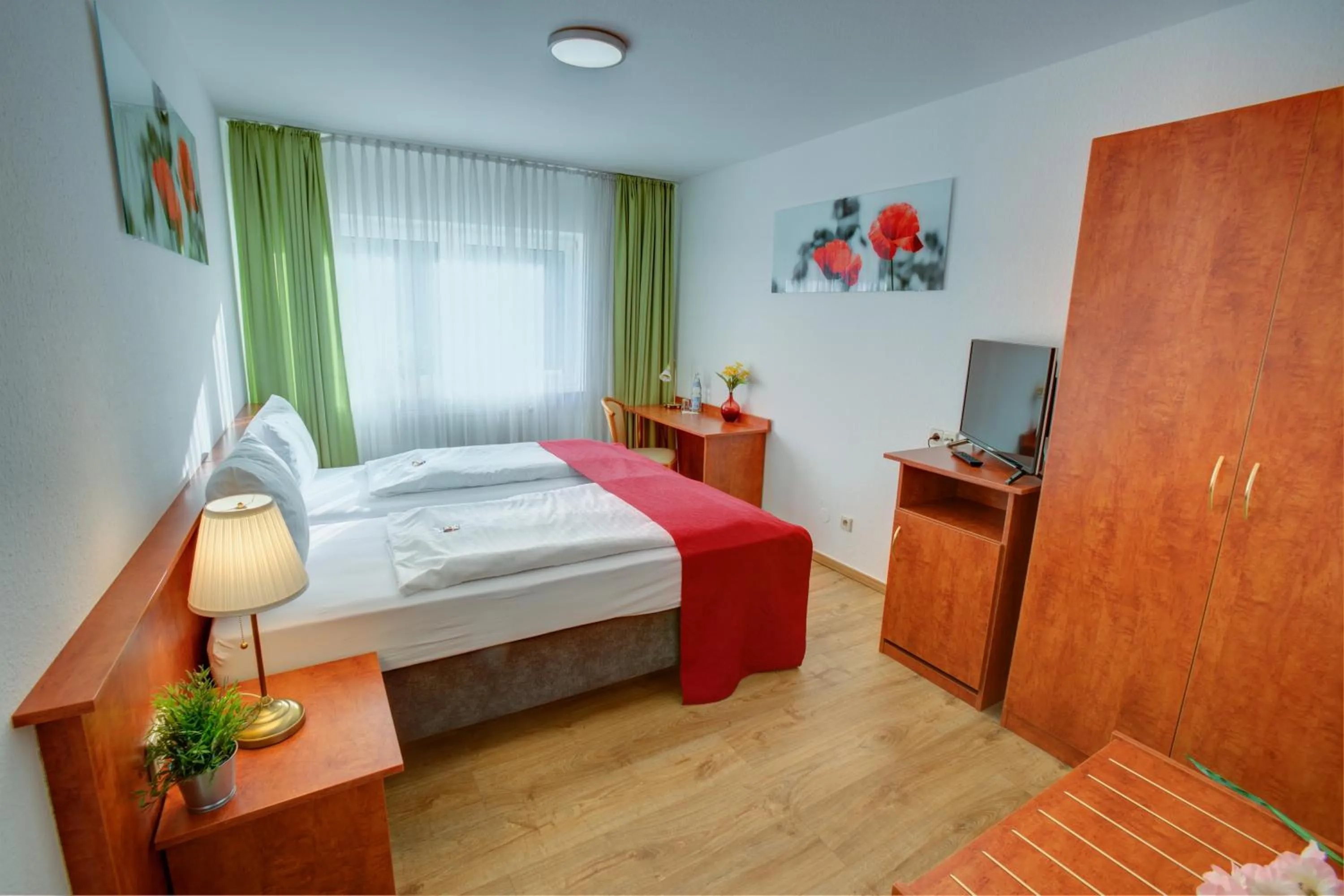 Bed in Hotel Leo Mühlhausen