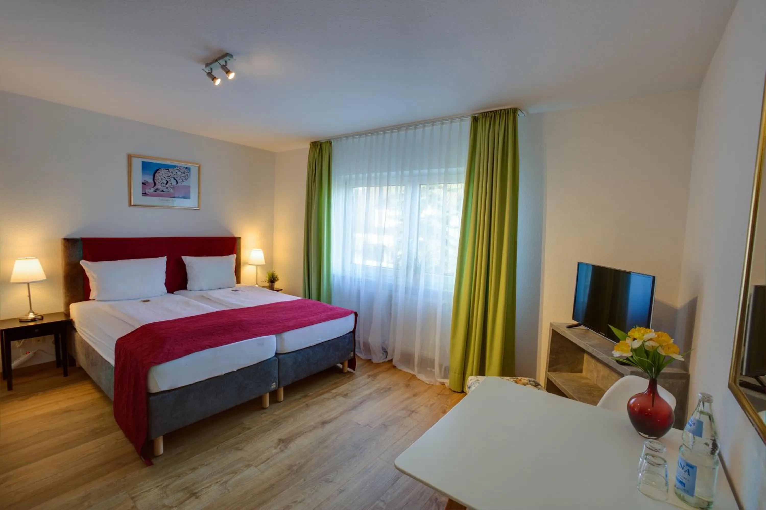 Bed in Hotel Leo Mühlhausen