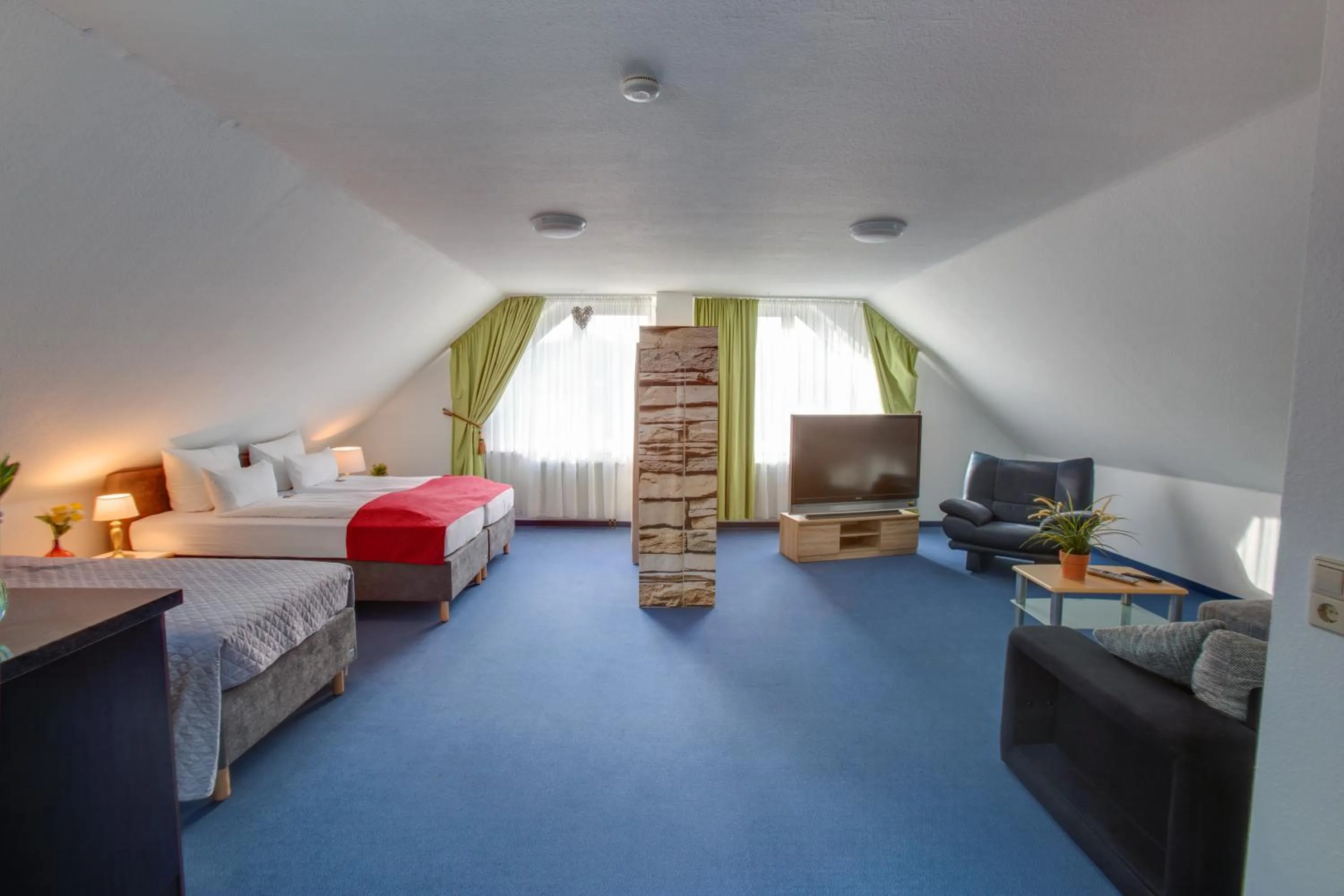 Bed in Hotel Leo Mühlhausen