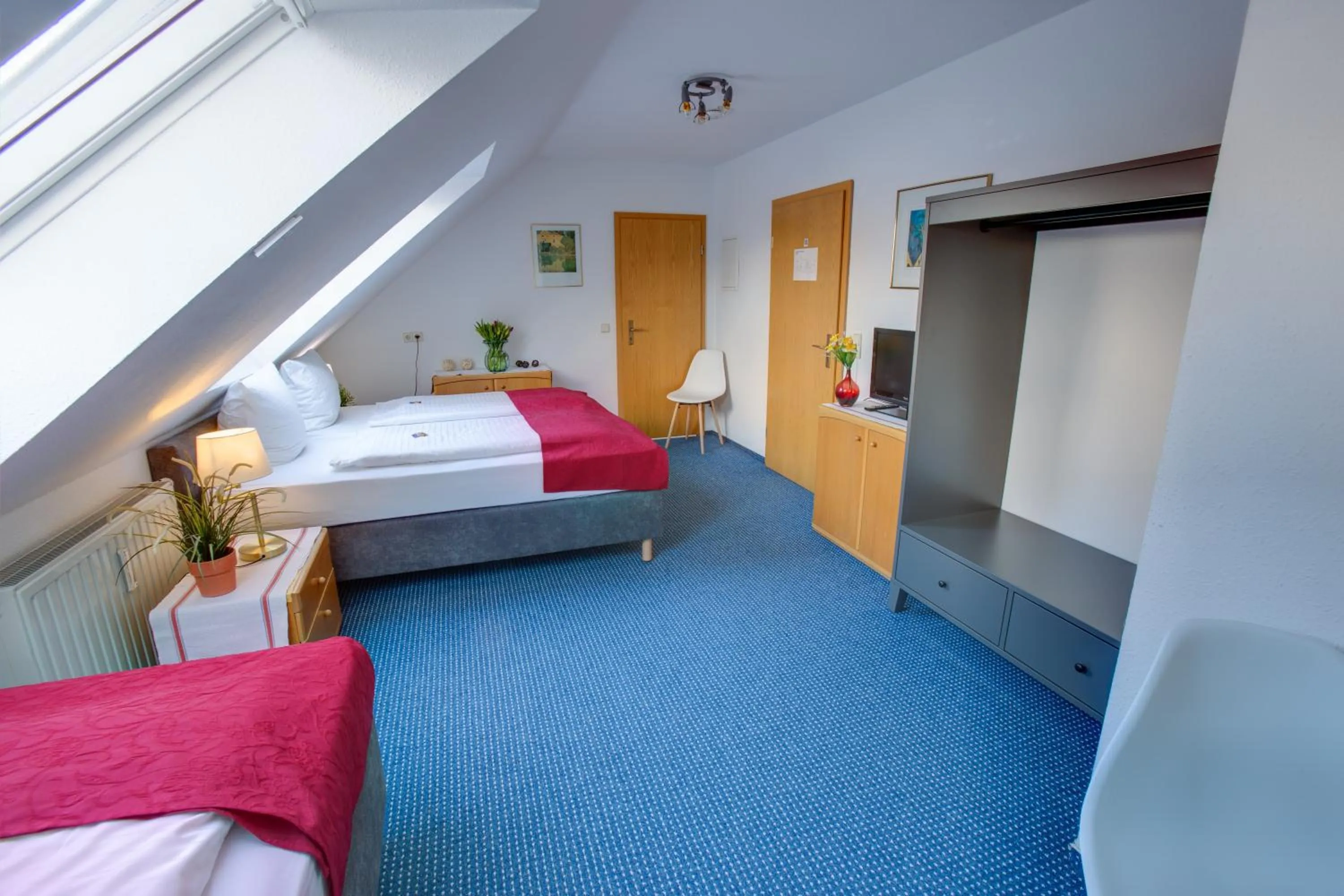 Bed in Hotel Leo Mühlhausen