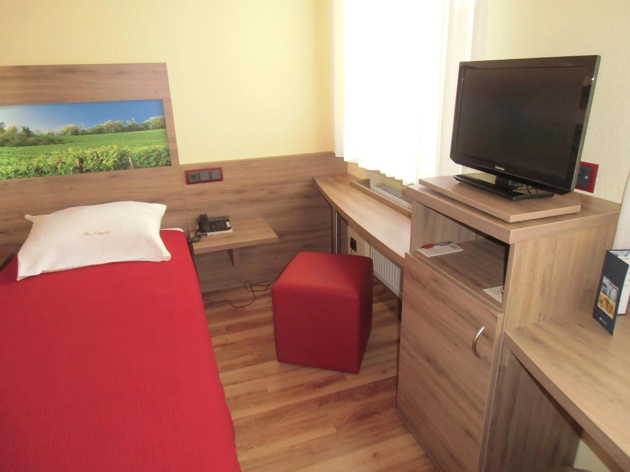 Photo of the whole room, Bed in Hotel-Gasthof Zum Freigericht