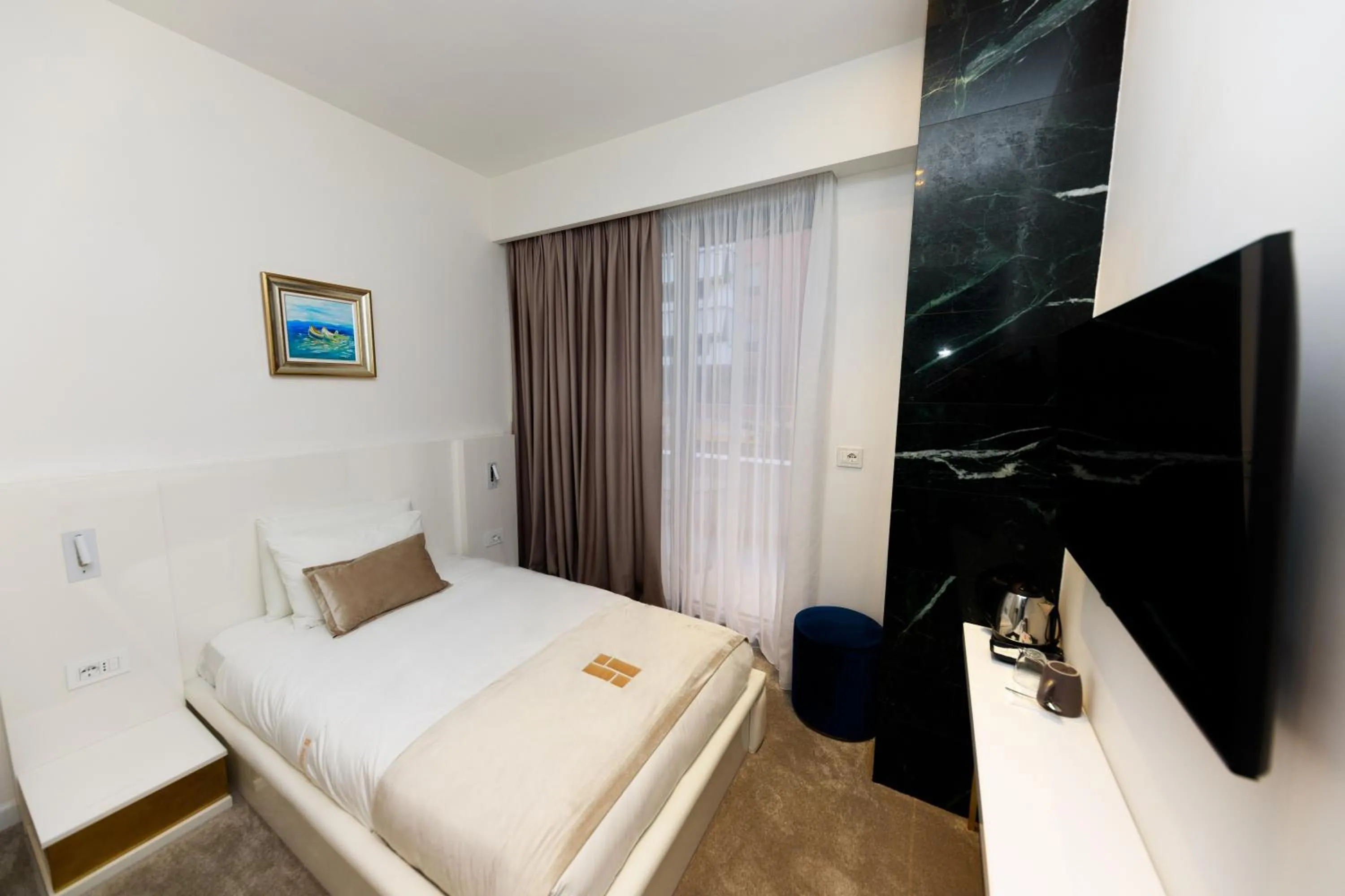 Bed in Habitat Hotel Tirana